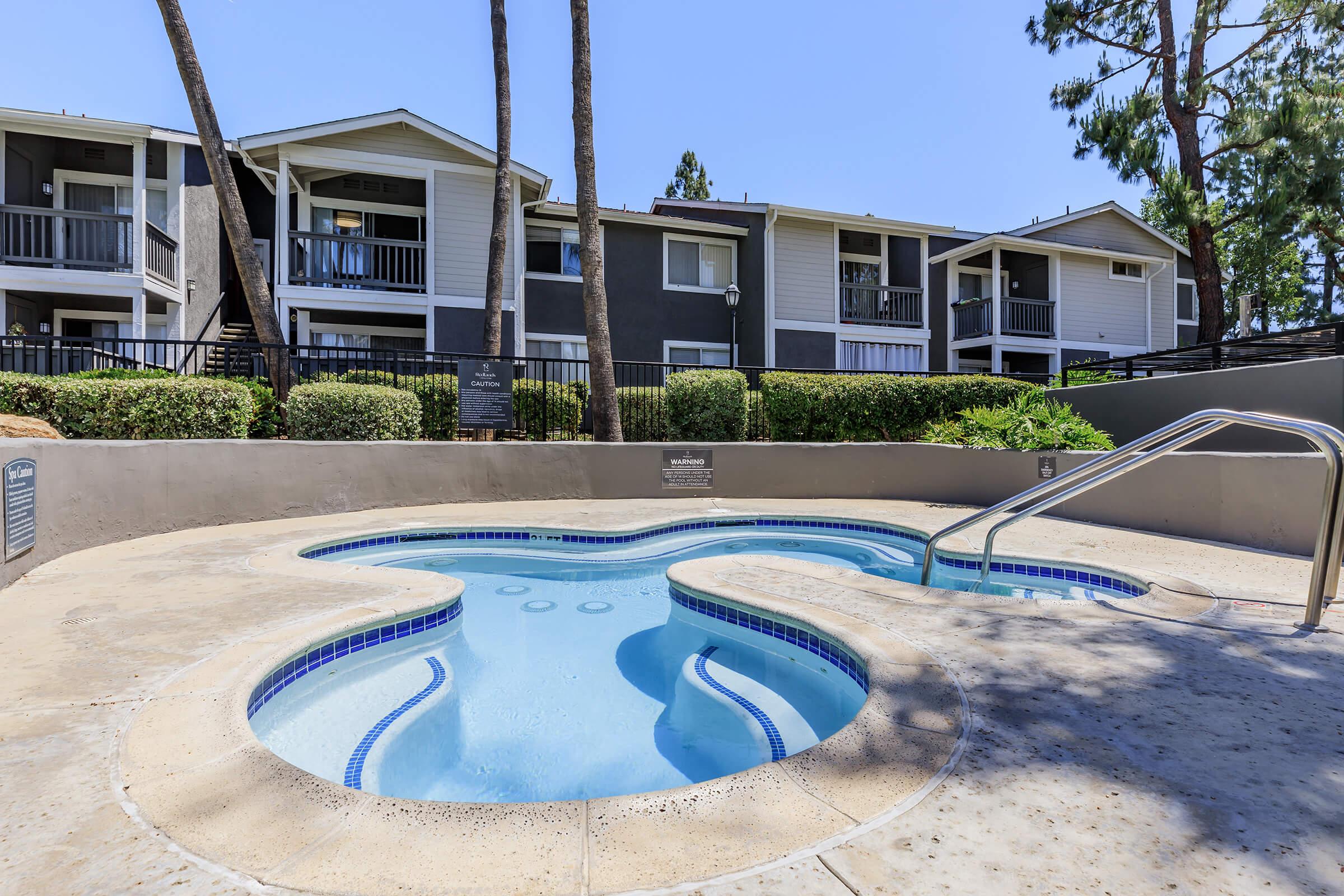 a pool next to a building