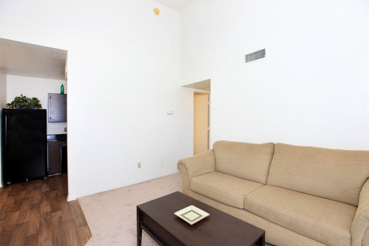 a living room with a wood floor