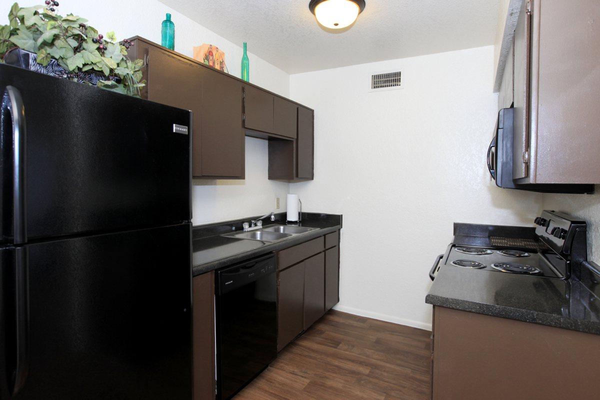 a stainless steel refrigerator in a kitchen