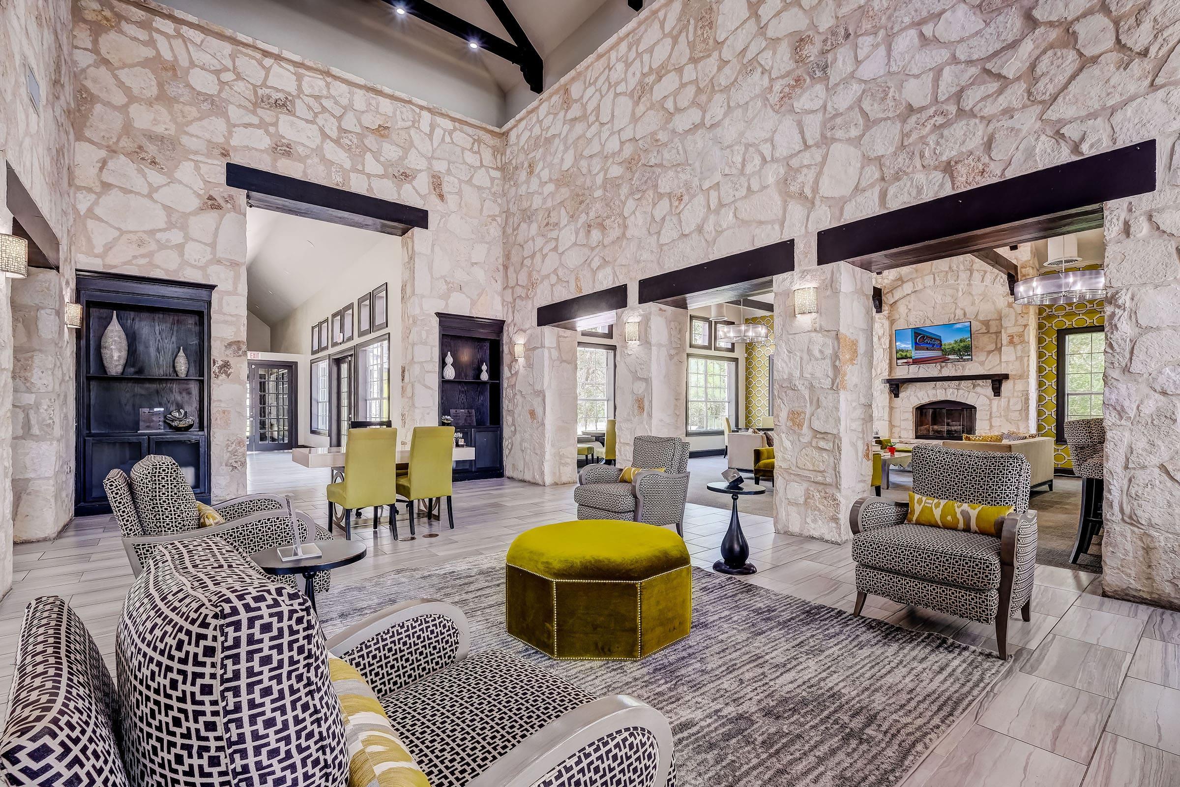 a living room filled with furniture and a fireplace