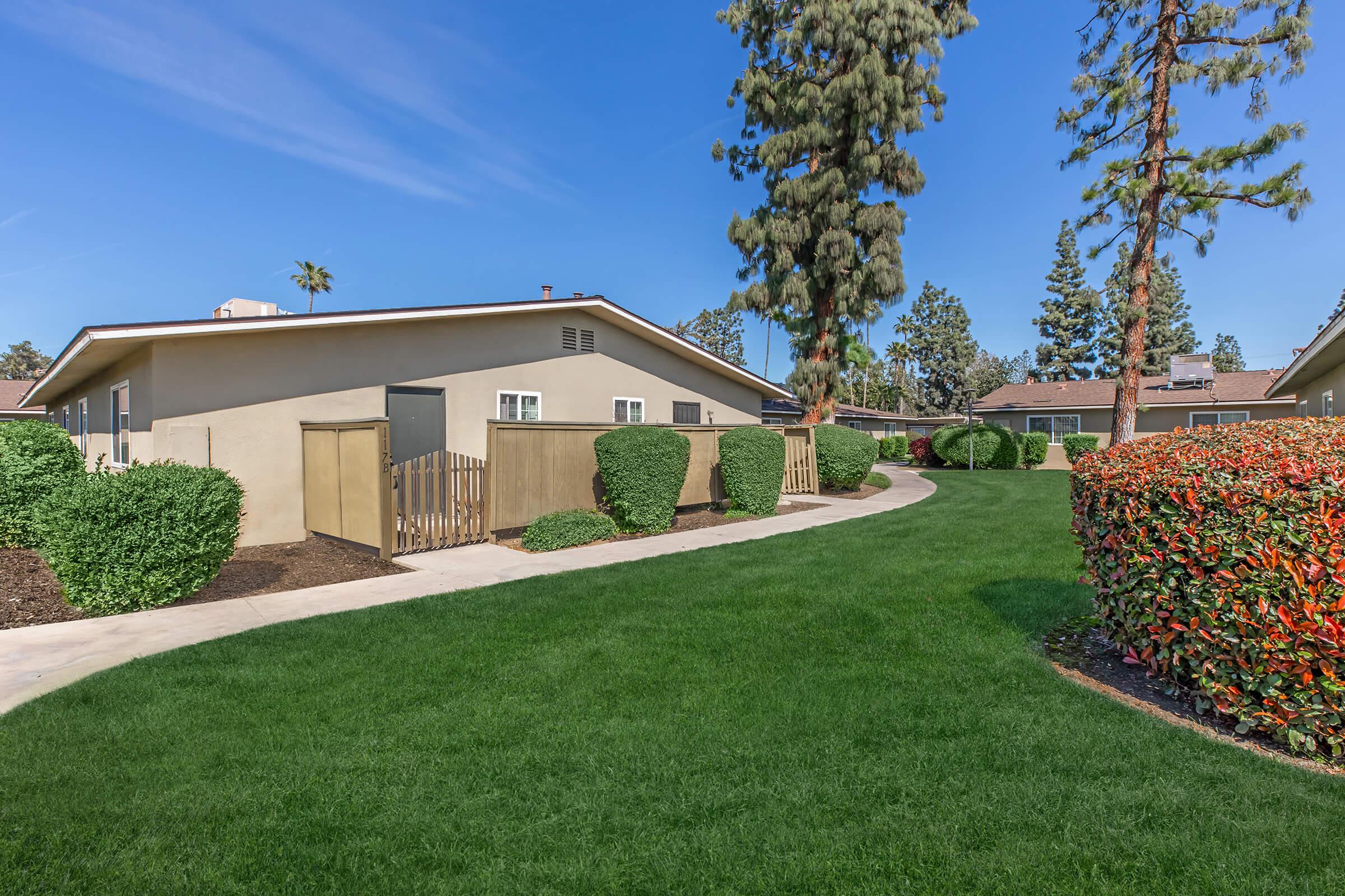 a large lawn in front of a house