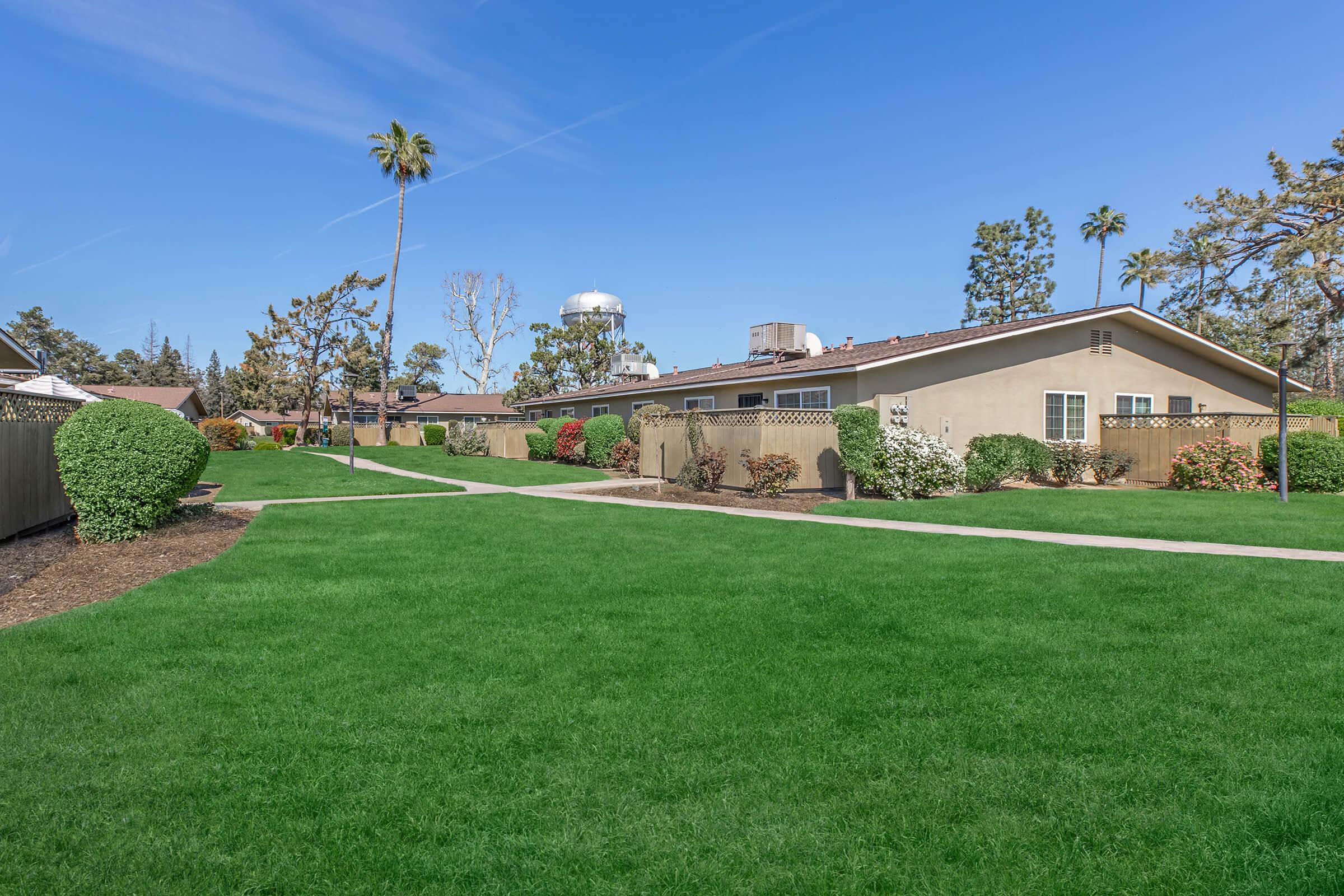 a large lawn in front of a house