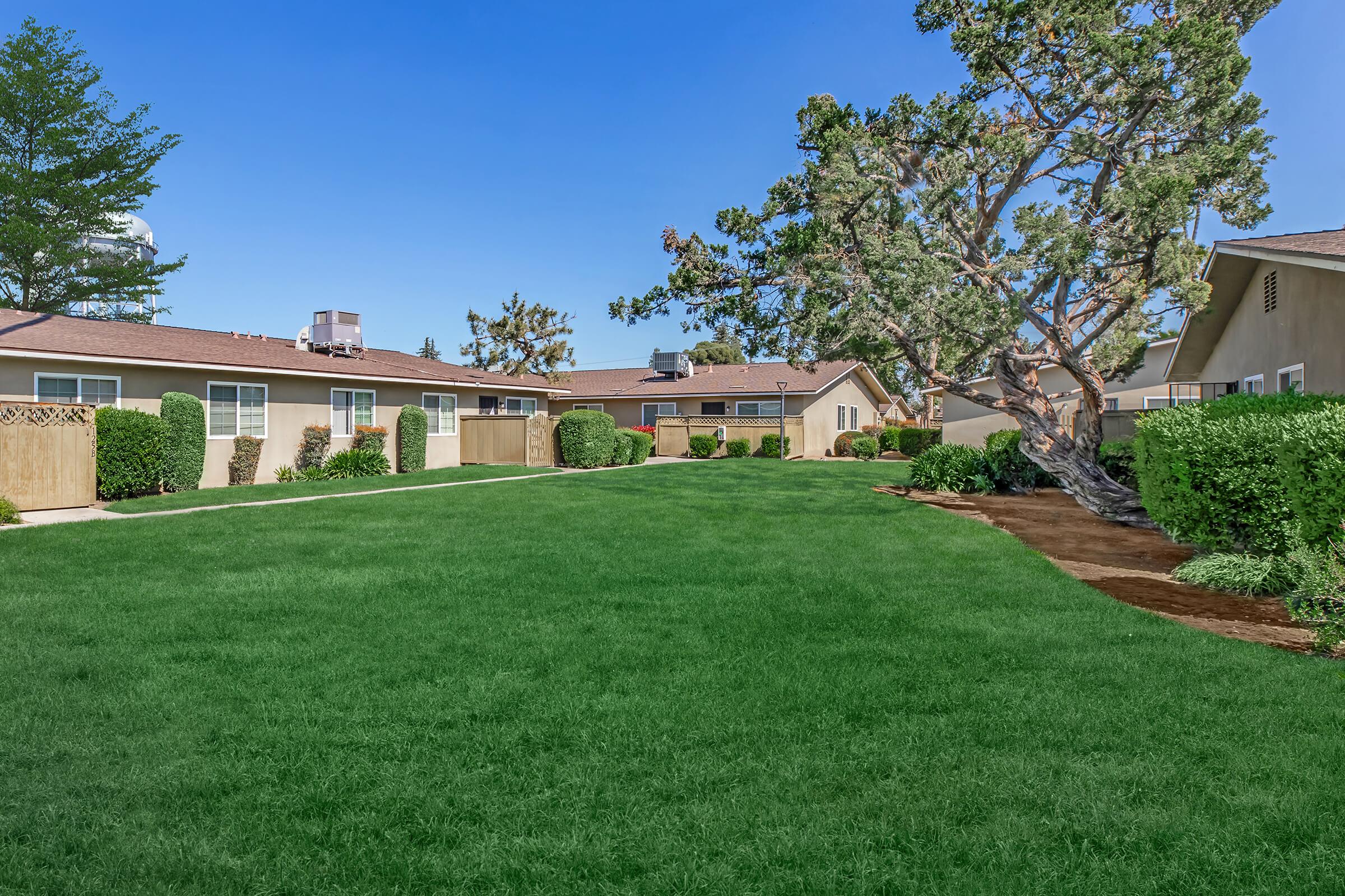 a large lawn in front of a house