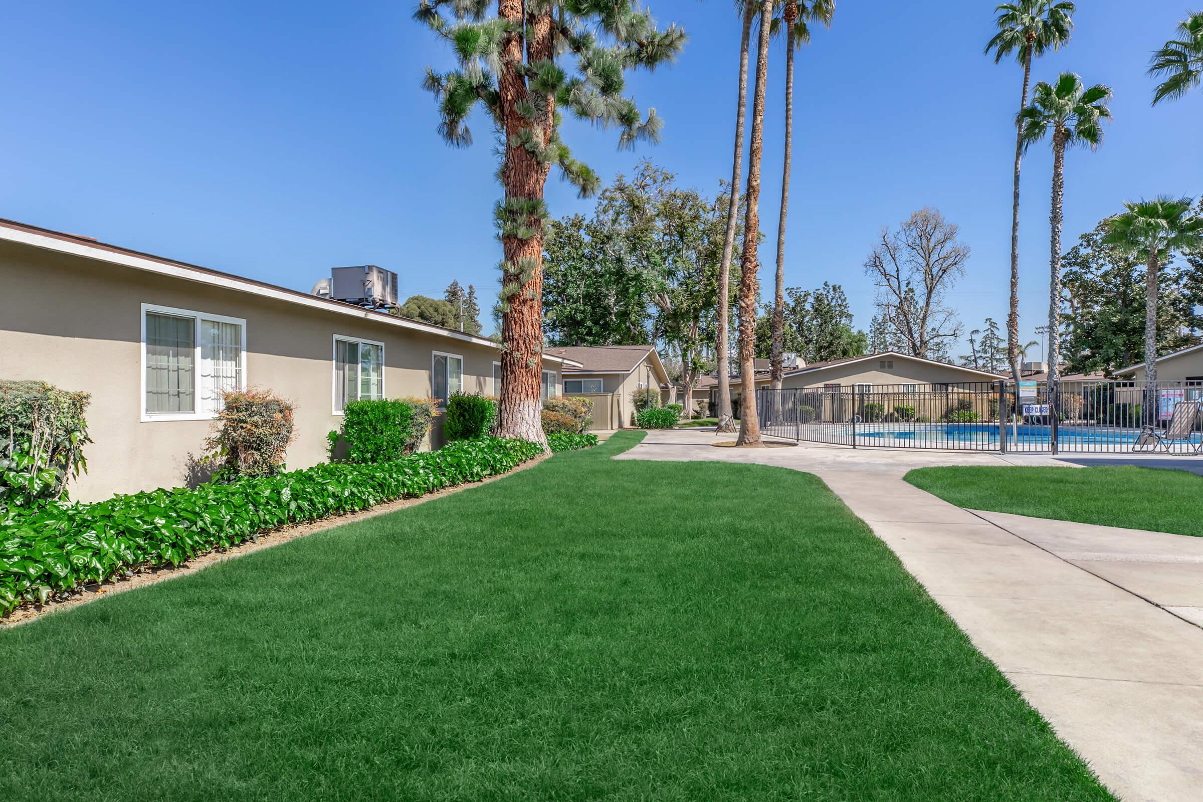 a large lawn in front of a house