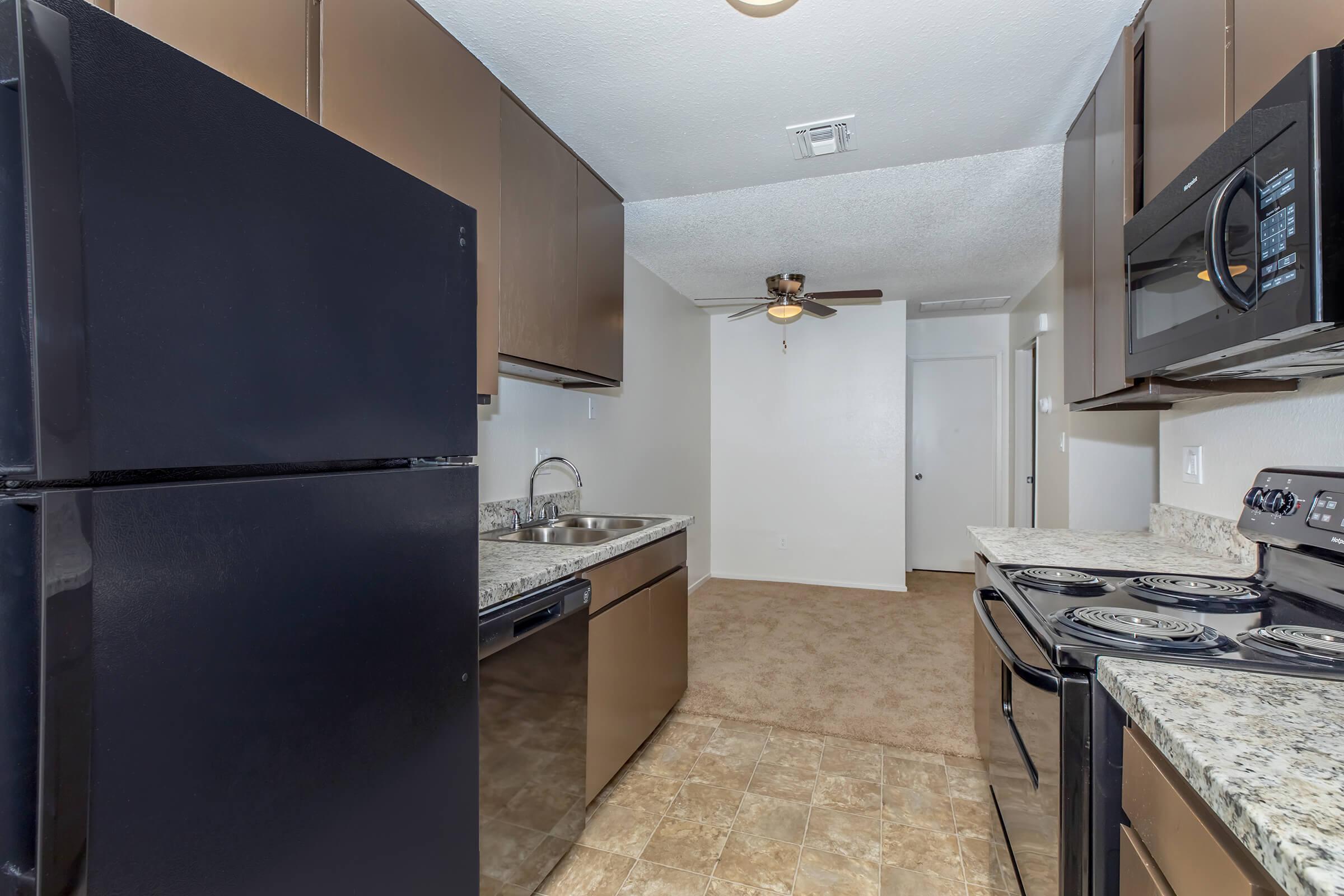 a stainless steel refrigerator in a kitchen