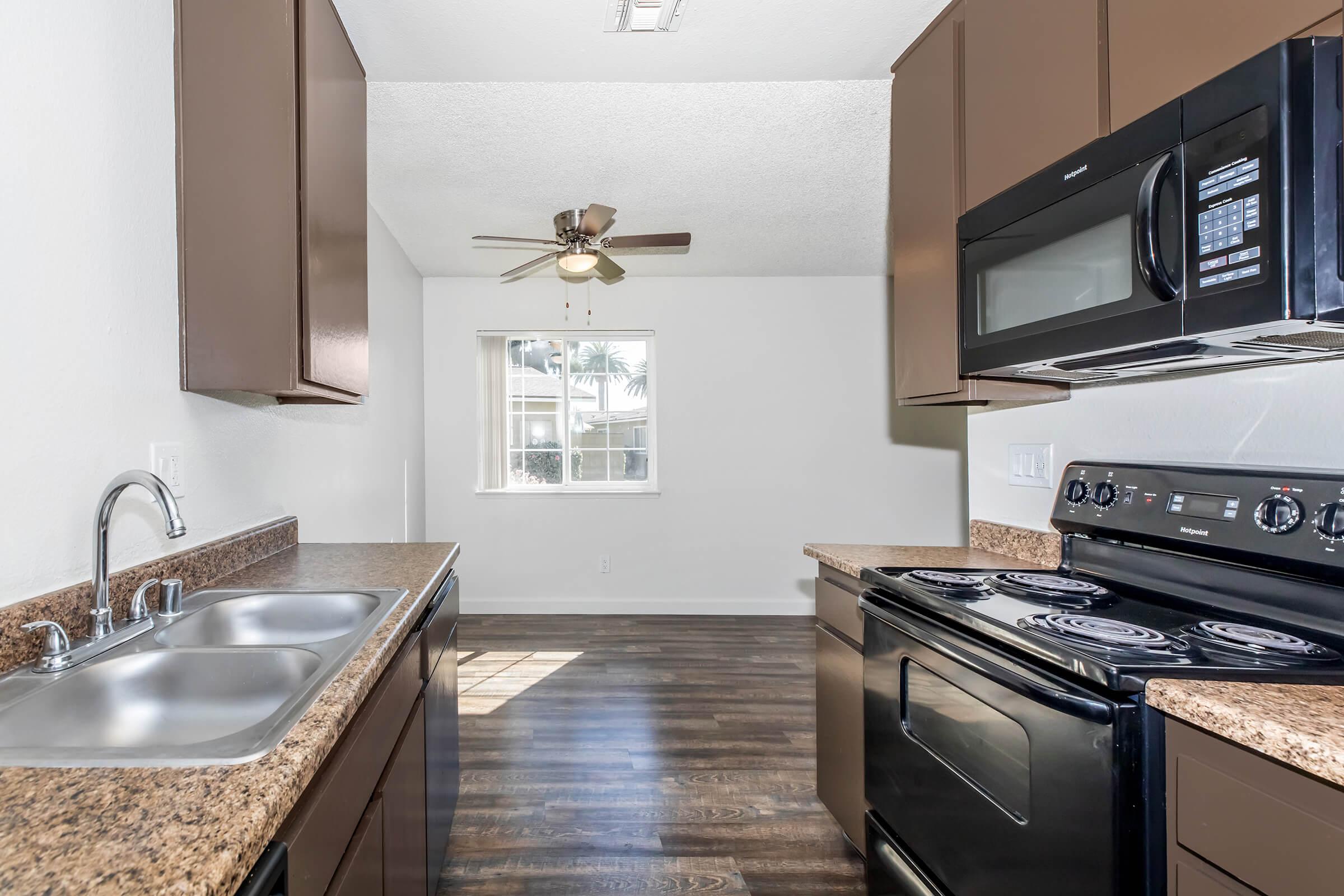 a modern kitchen with stainless steel appliances