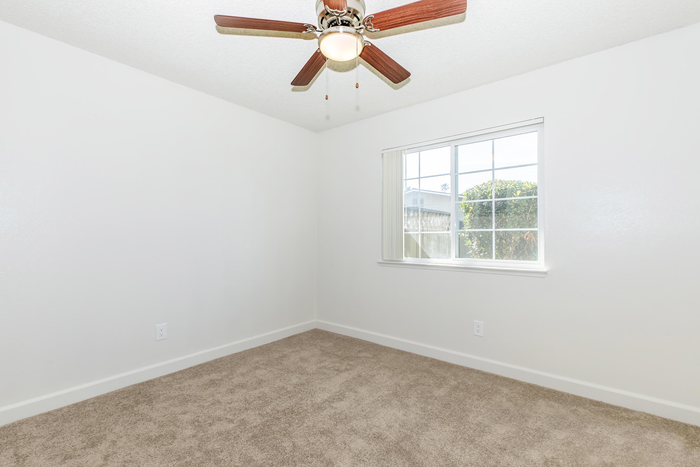 a room with a sink and a window