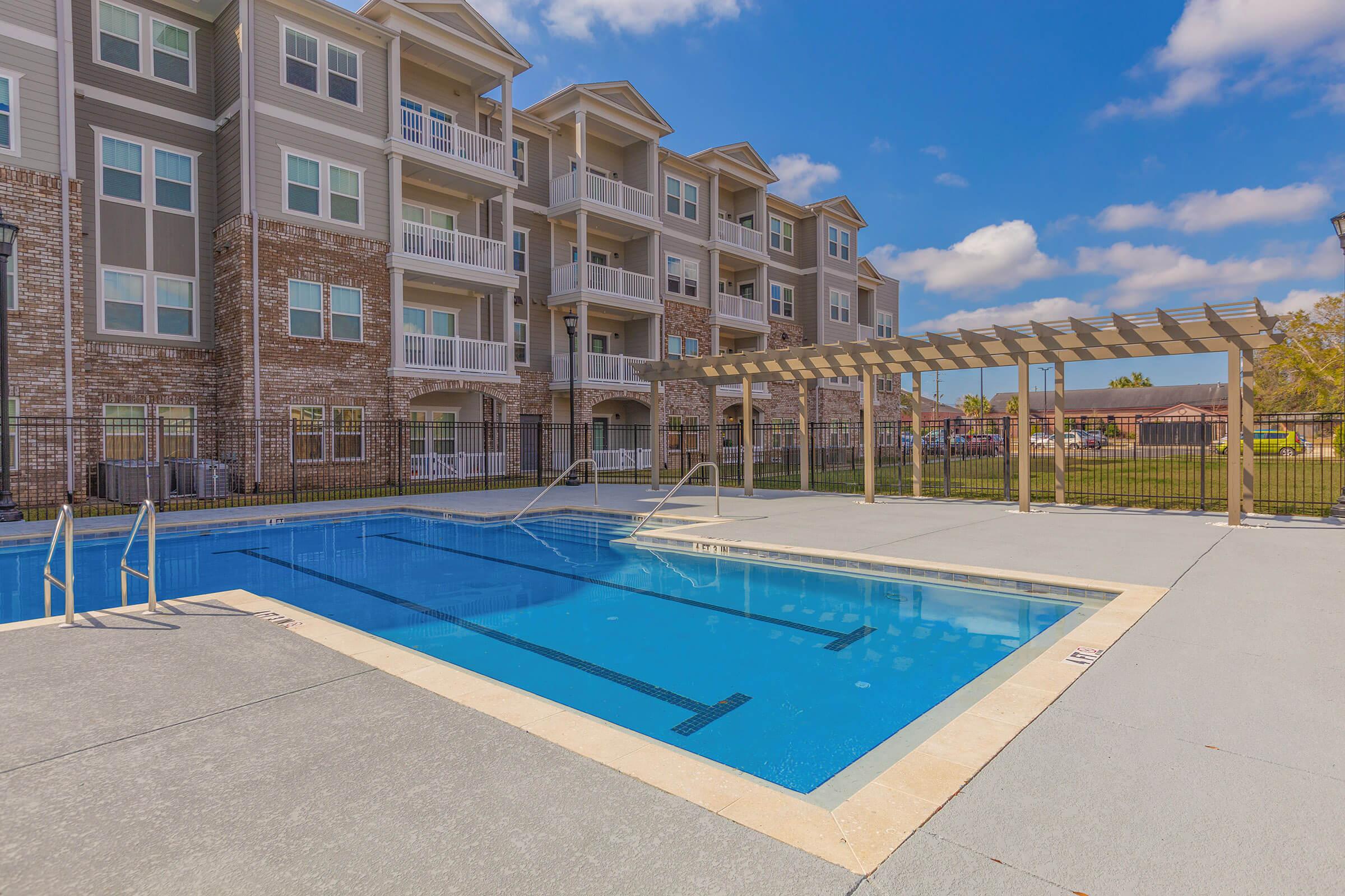 a pool next to a building