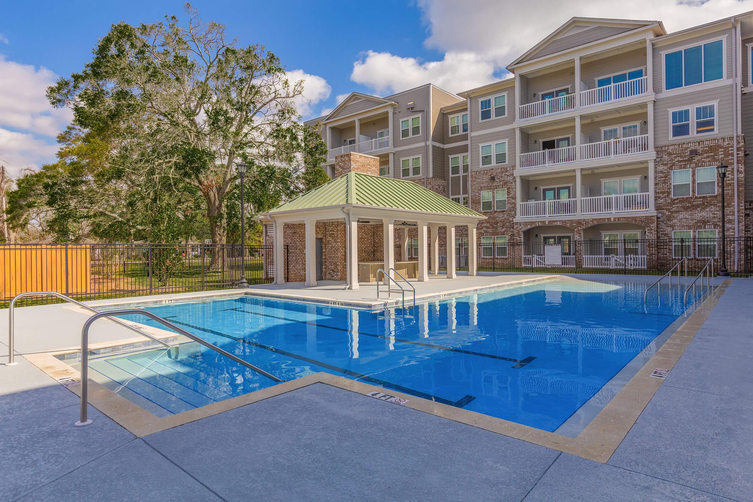 a pool next to a building