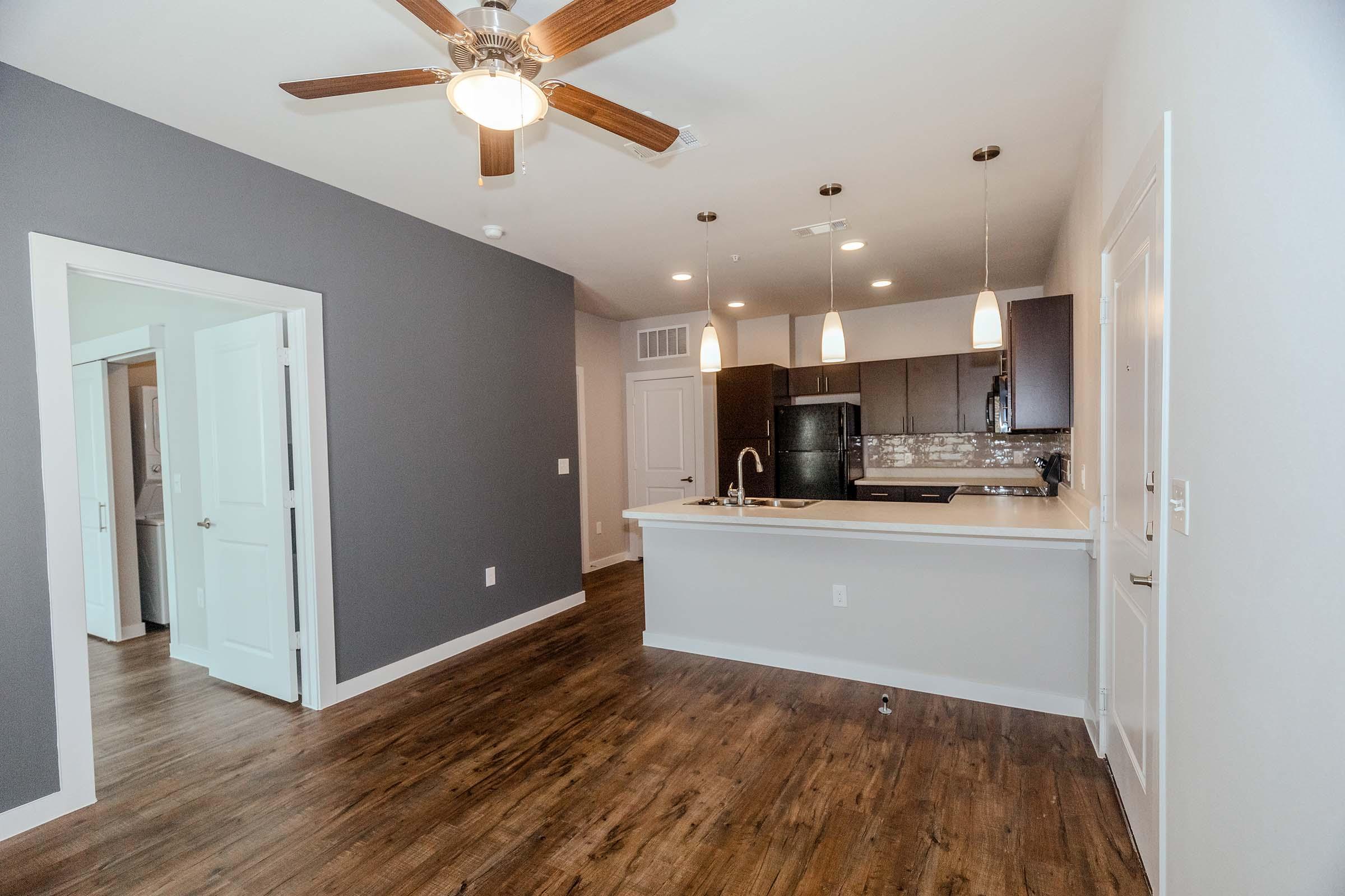 a kitchen with a wood floor