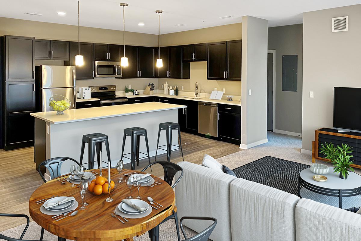 a kitchen with a dining room table