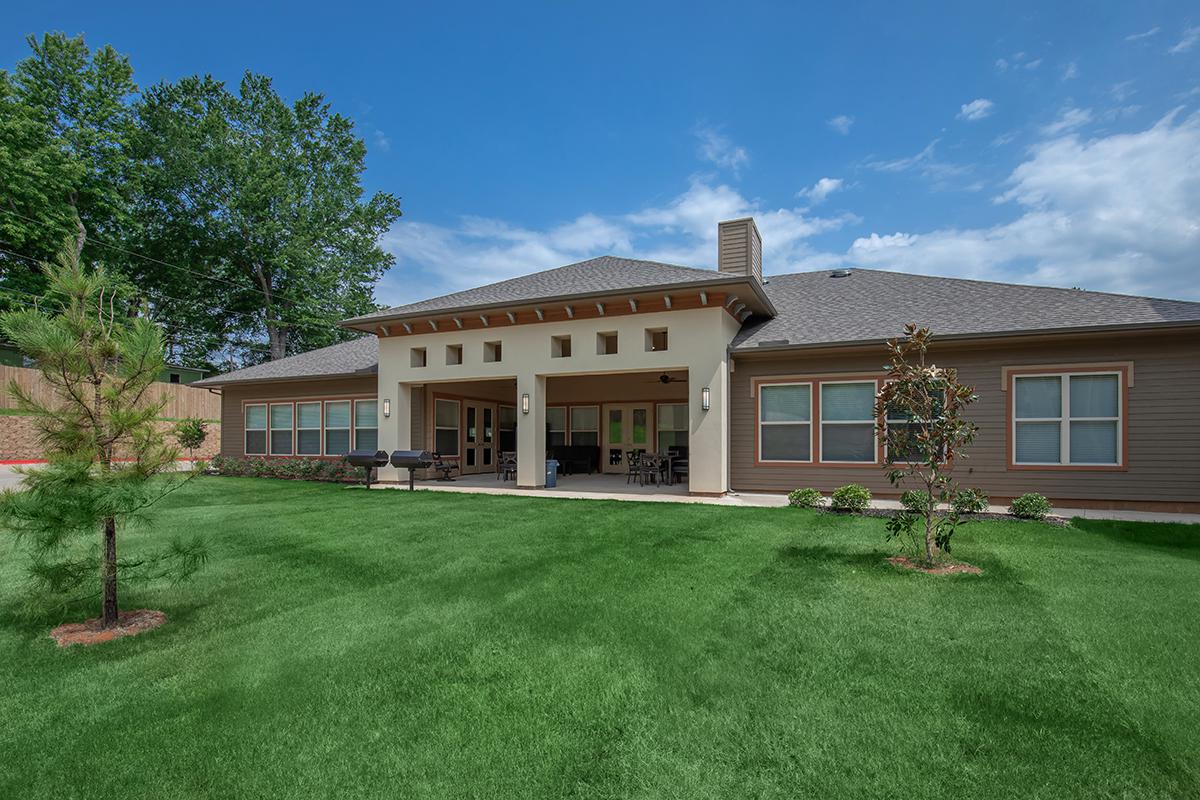 a large lawn in front of a house