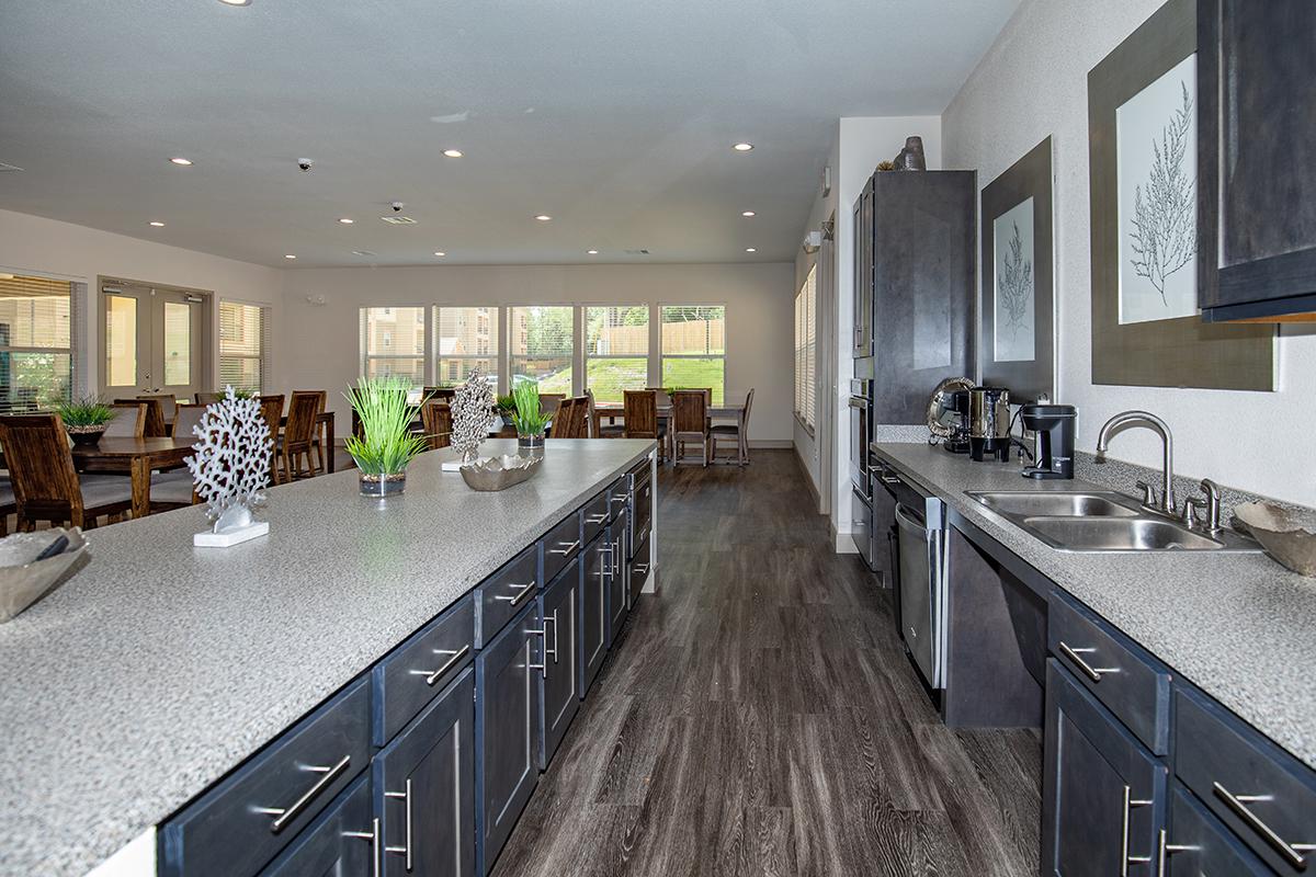 a modern kitchen with stainless steel appliances