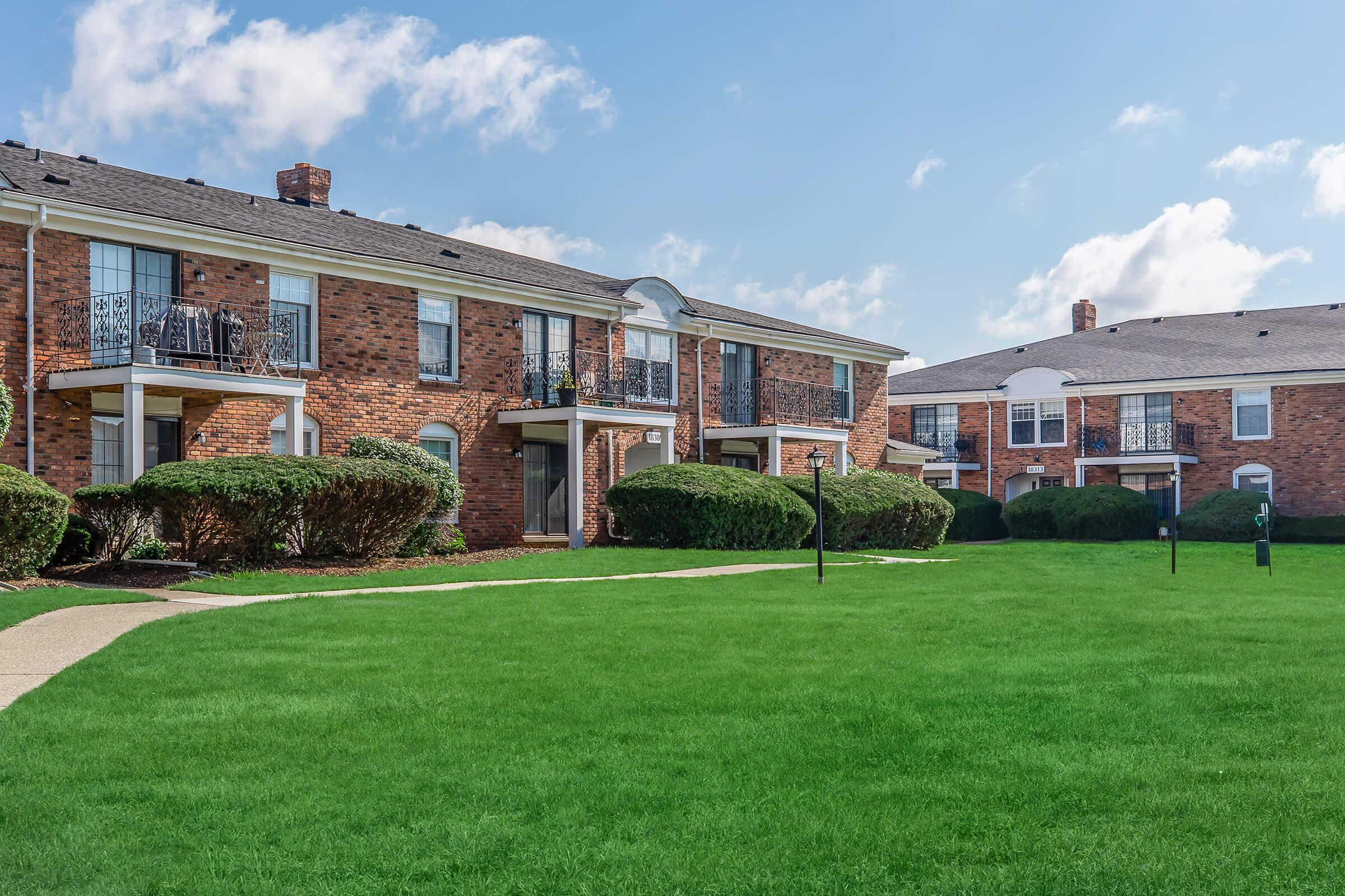 a large lawn in front of a building