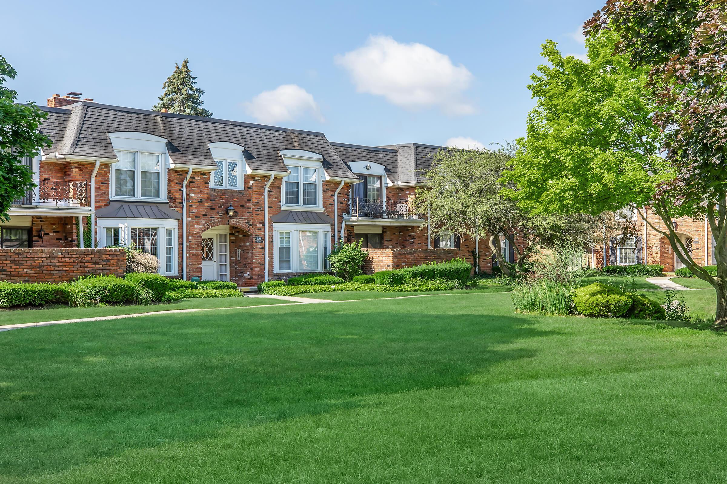 a large lawn in front of a house