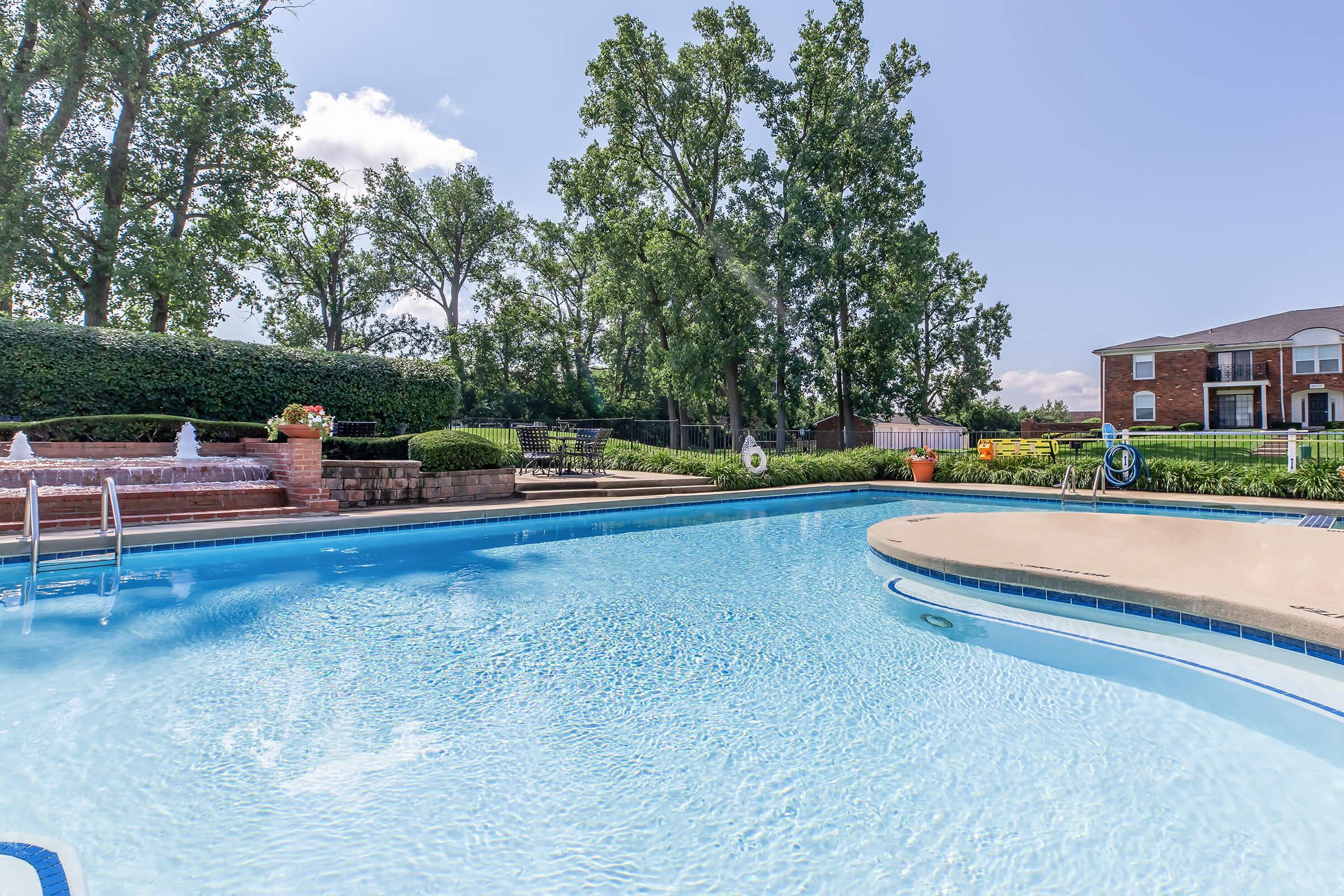 a pool next to a body of water