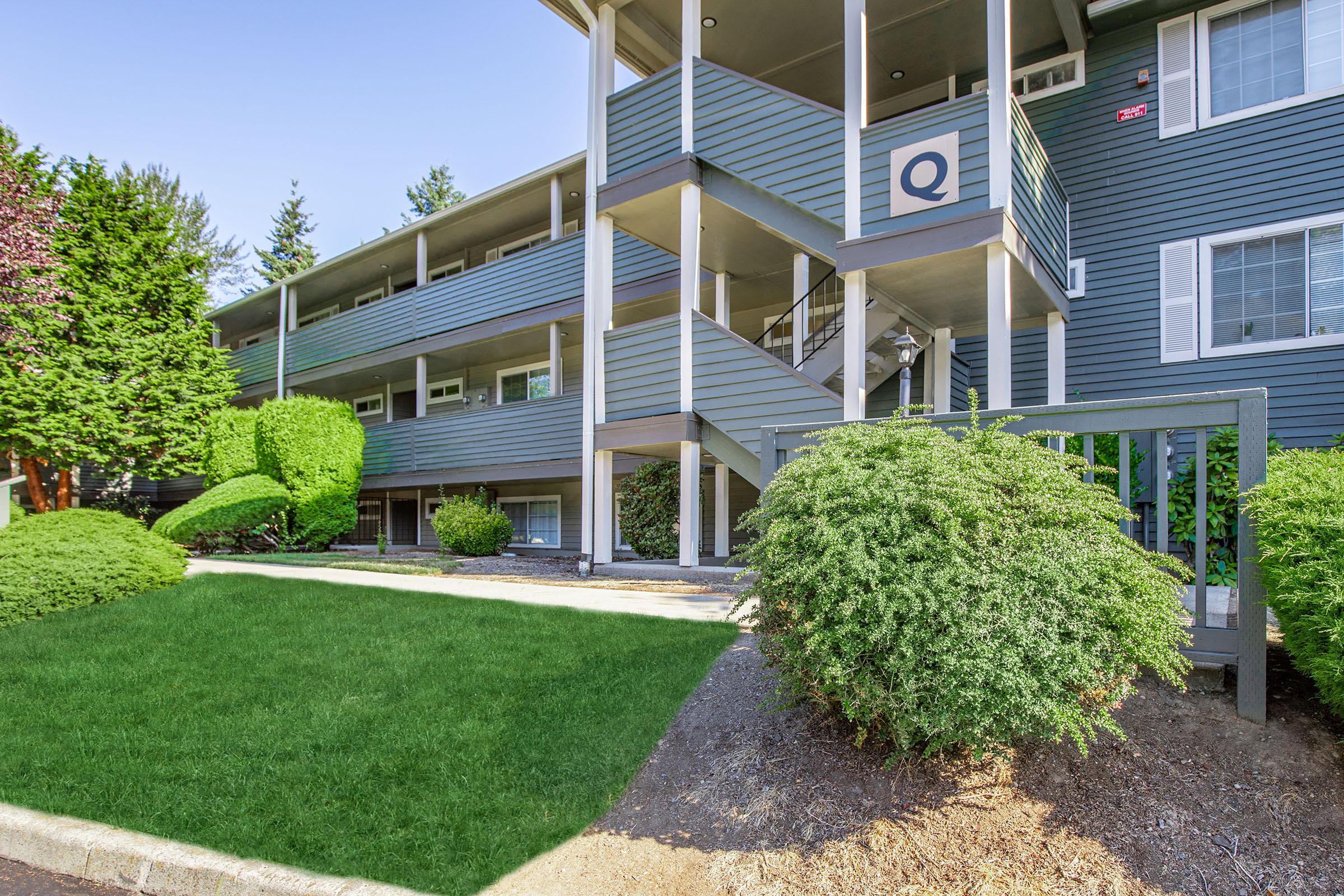 a large lawn in front of a building