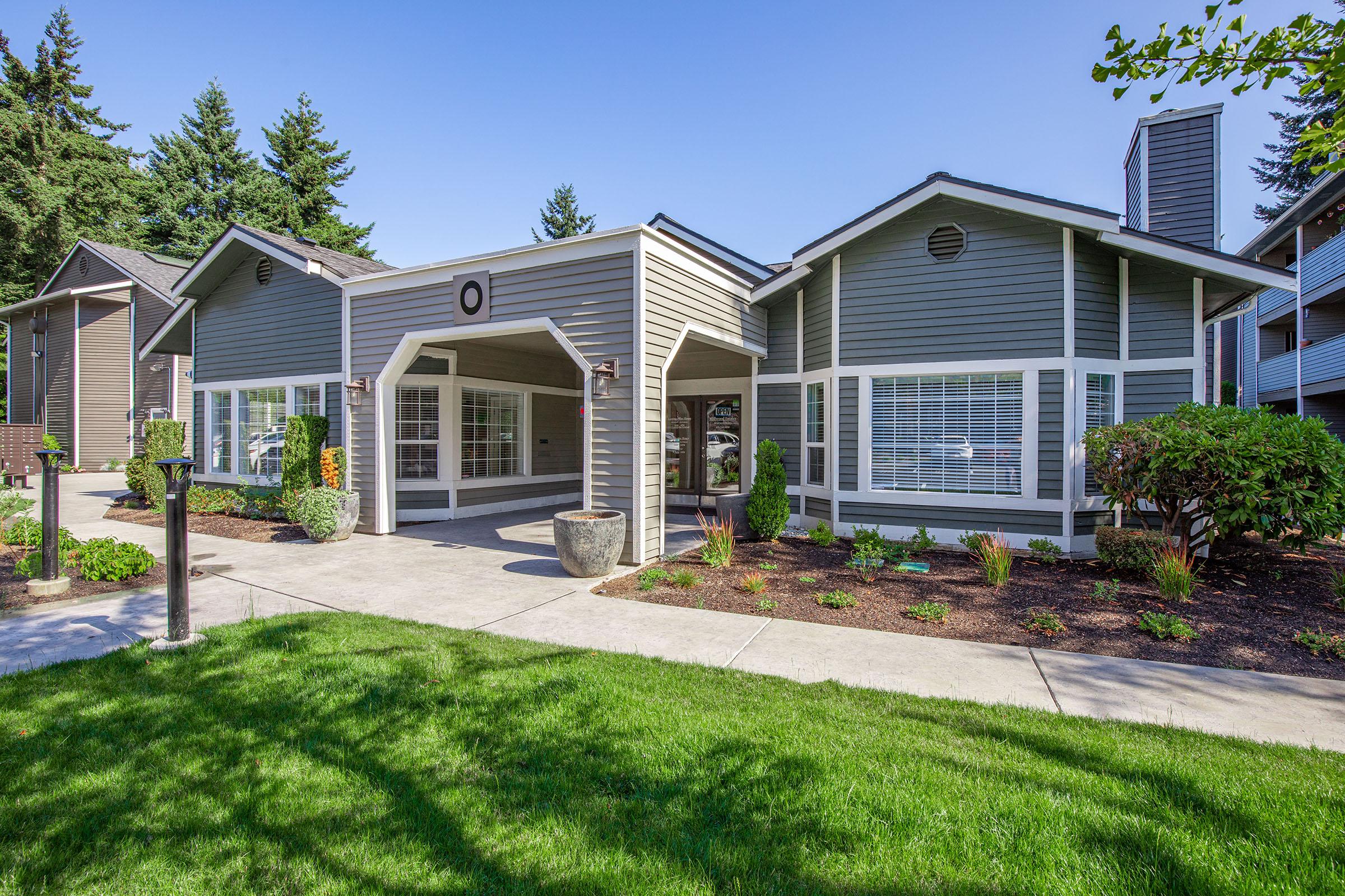 a large lawn in front of a house