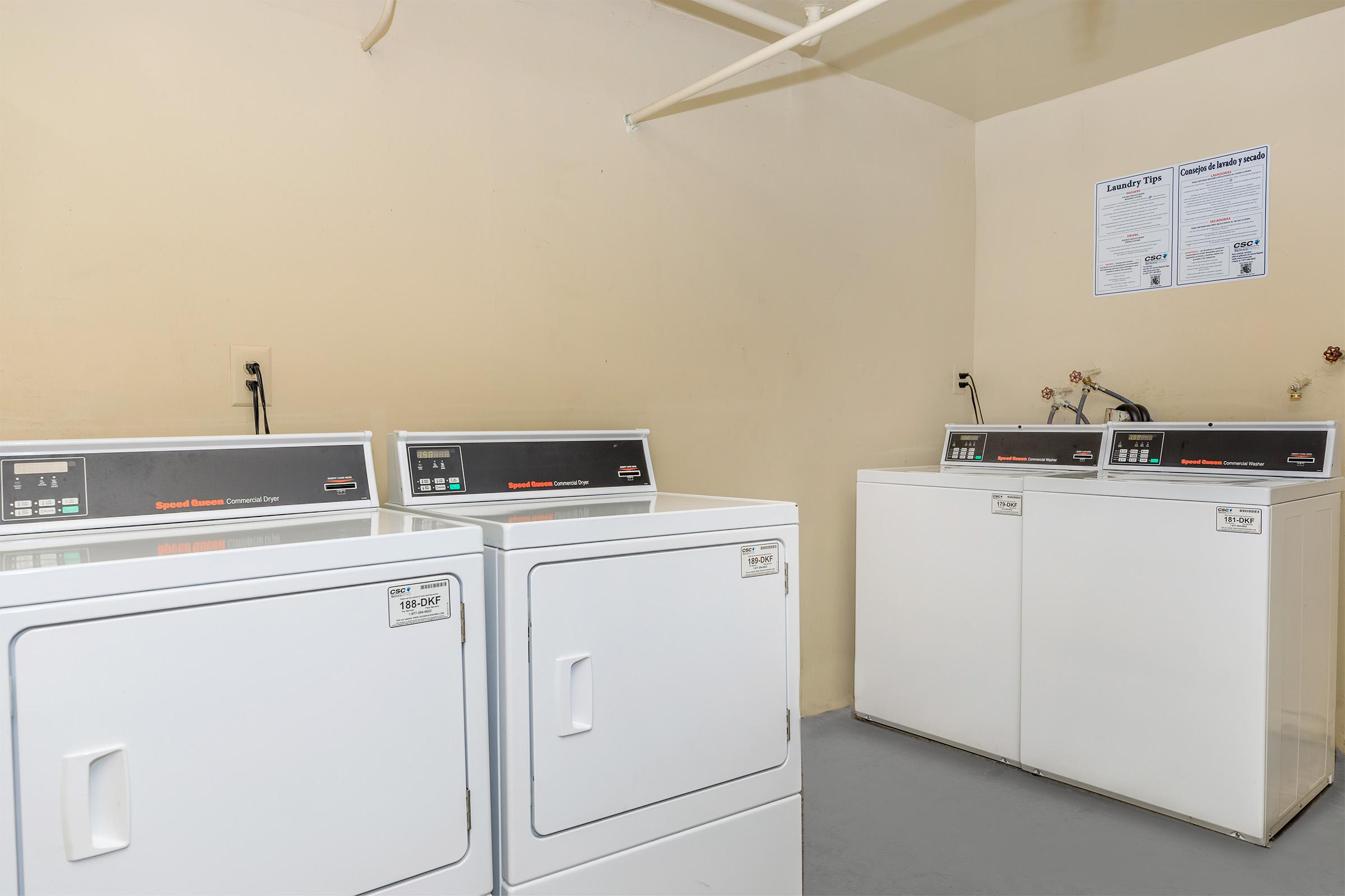 a kitchen with a stove and a refrigerator