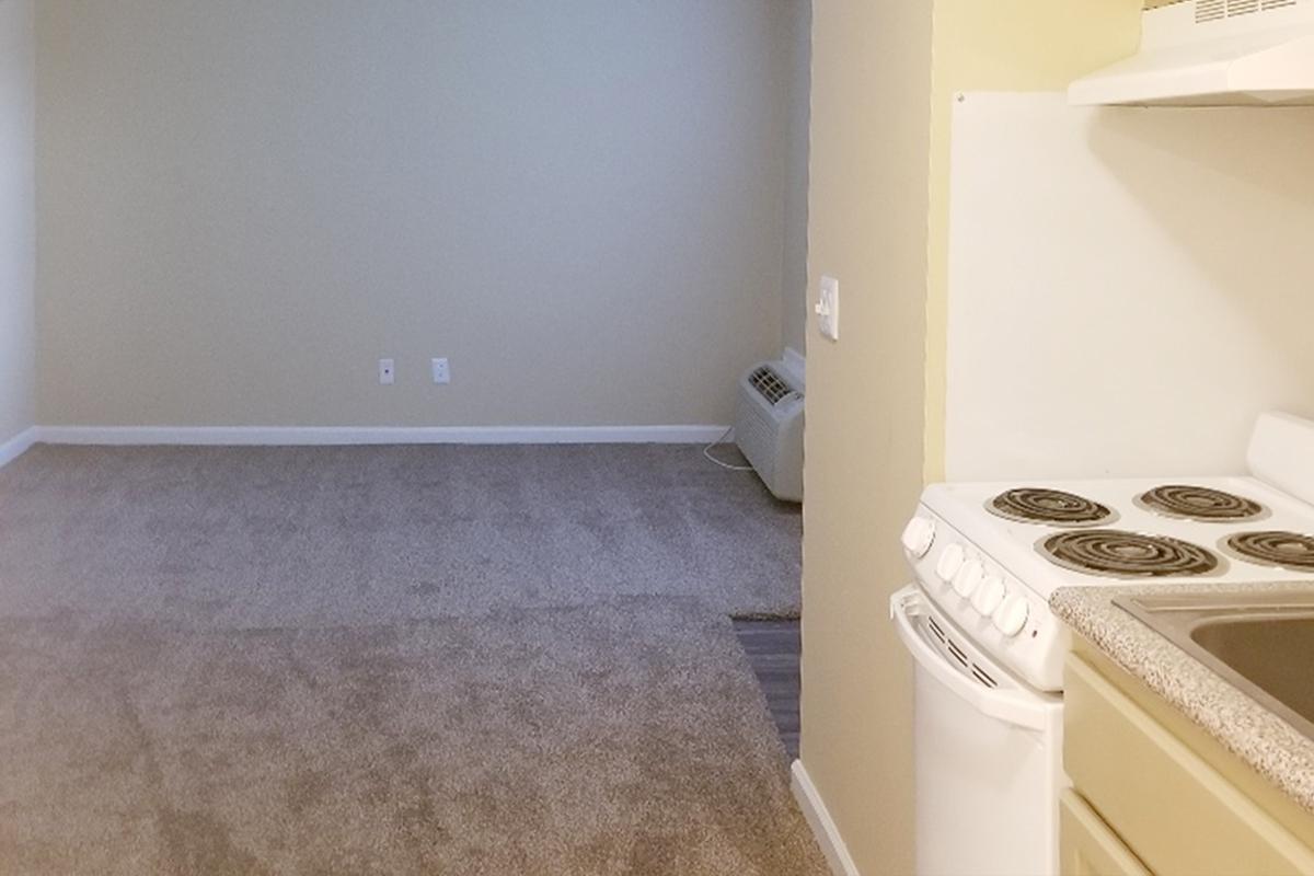 a white tub sitting next to a sink