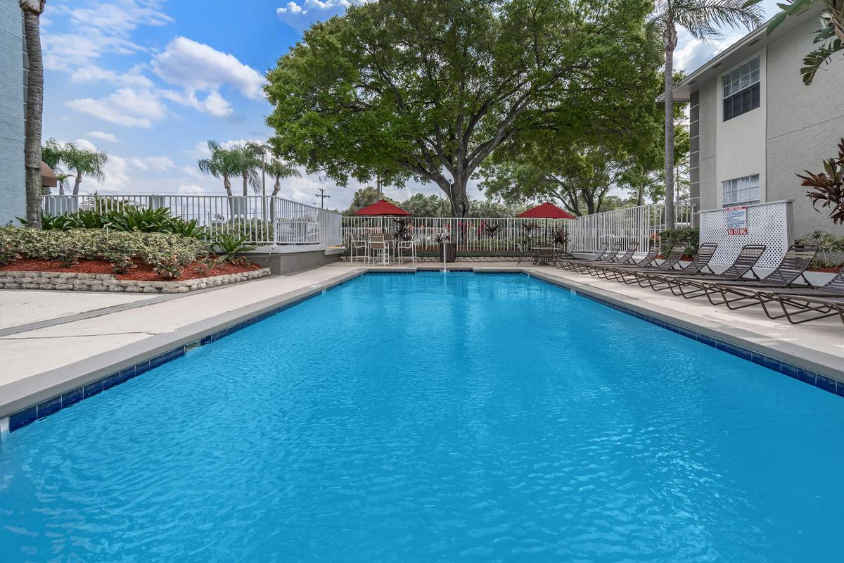 a house with a large pool of water