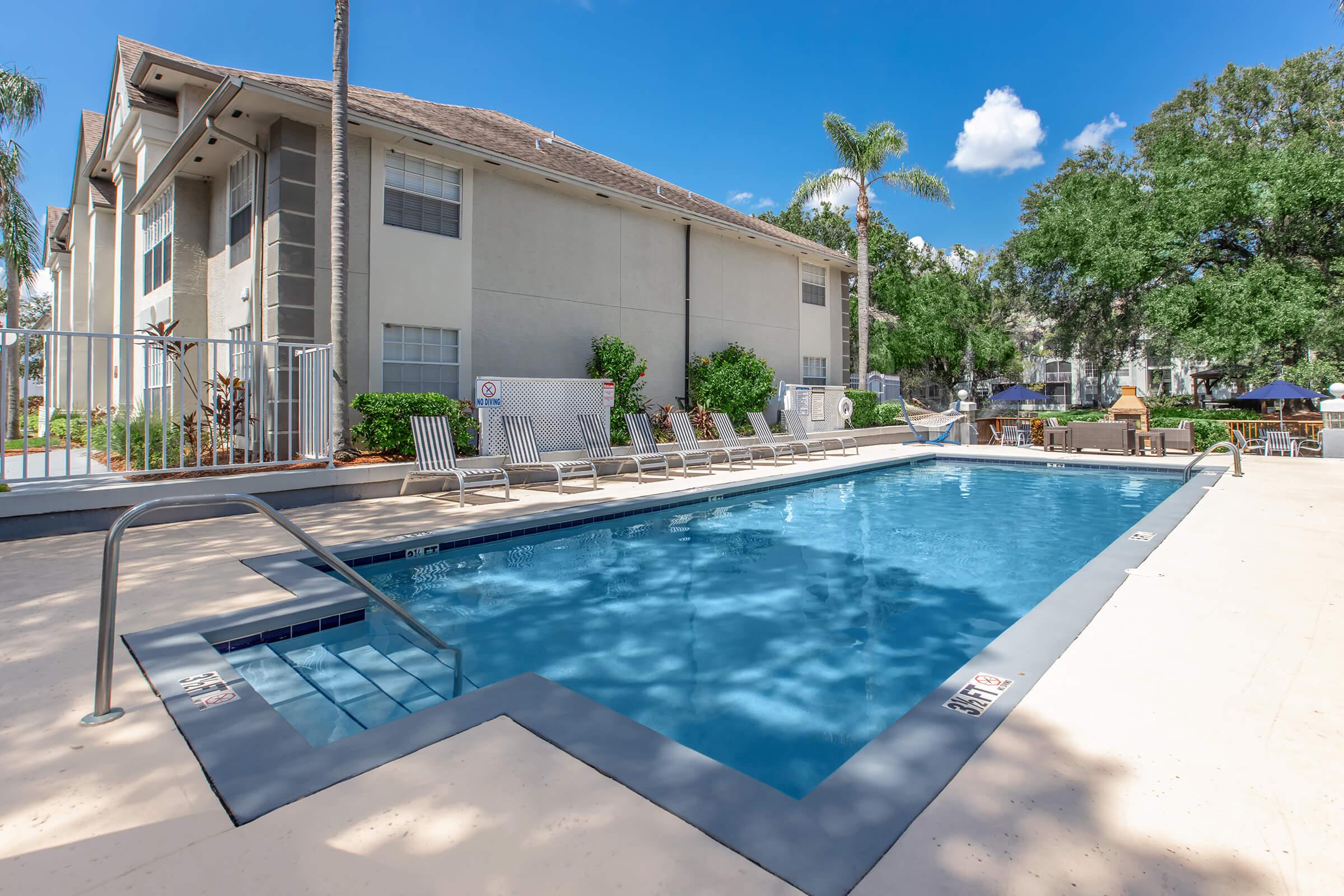 a pool next to a building