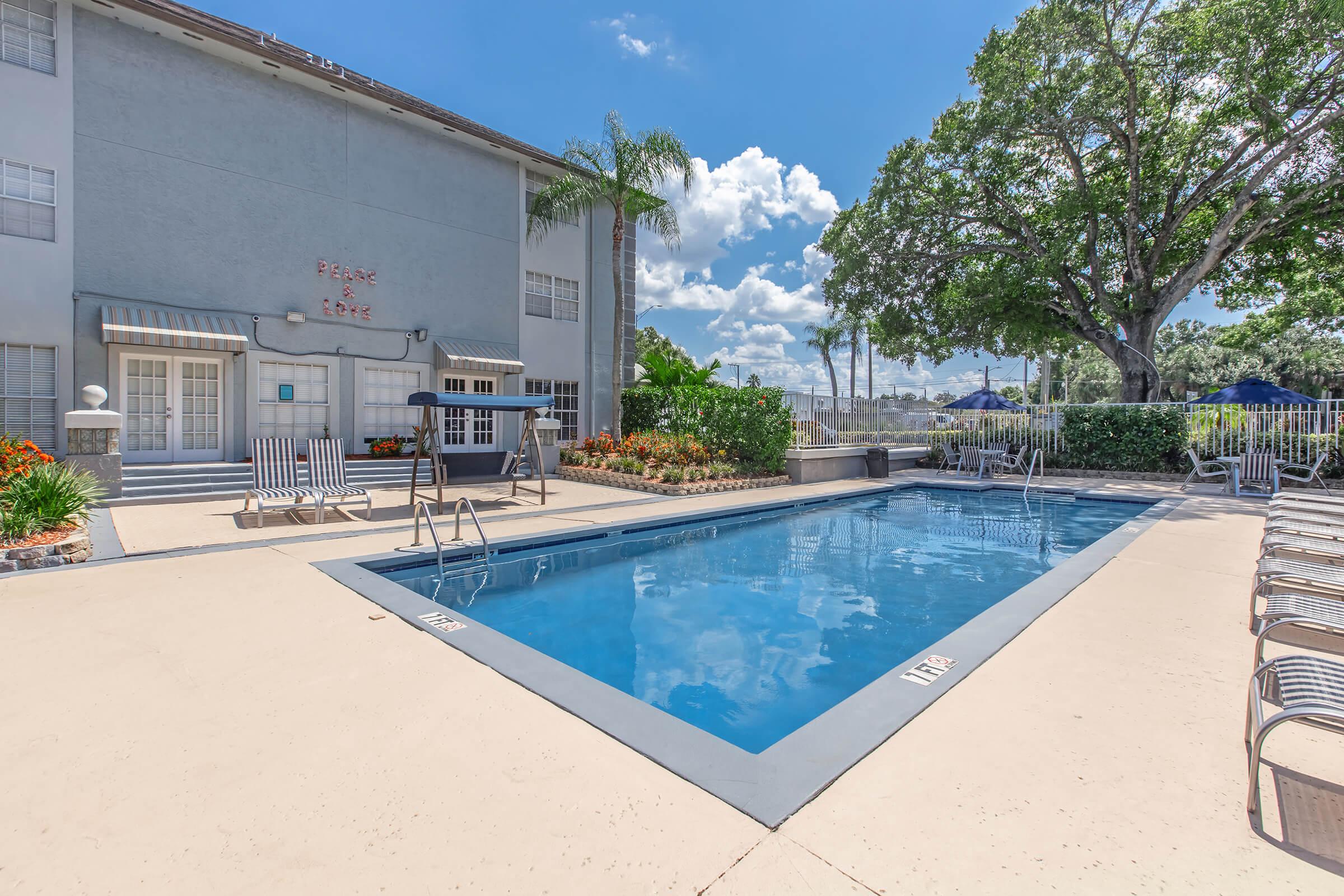 a pool next to a building