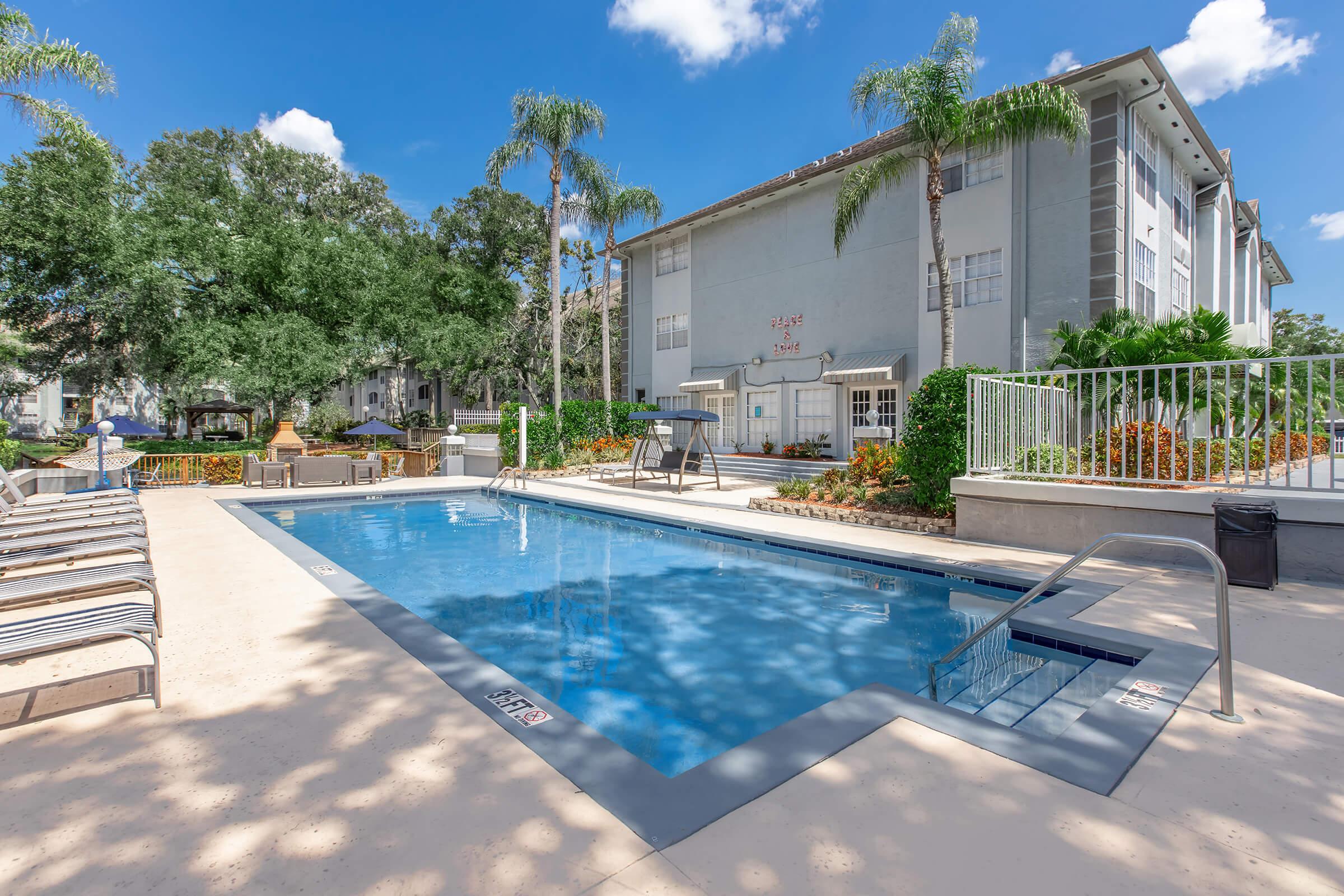 a pool next to a building