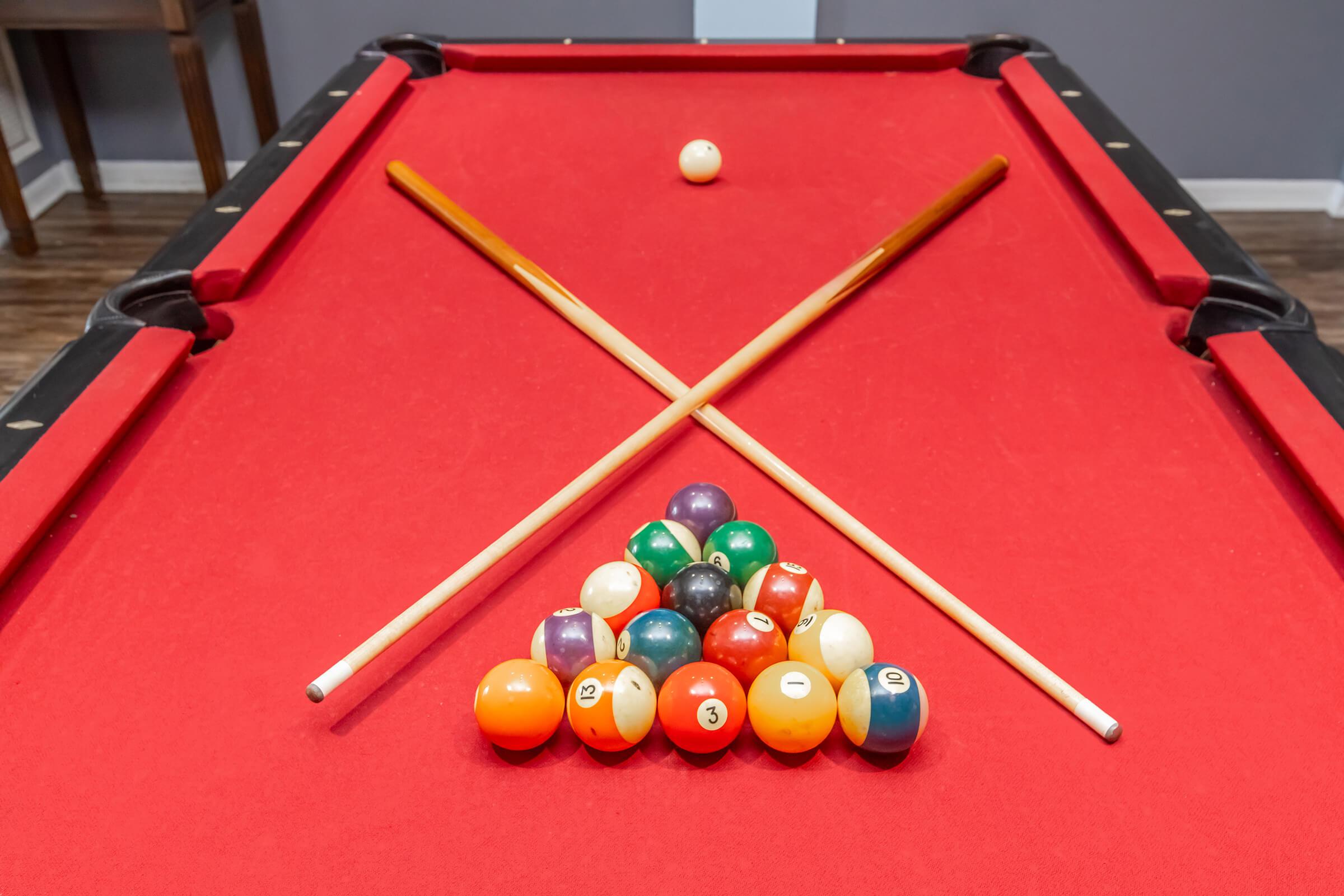 a table with a ball in a room