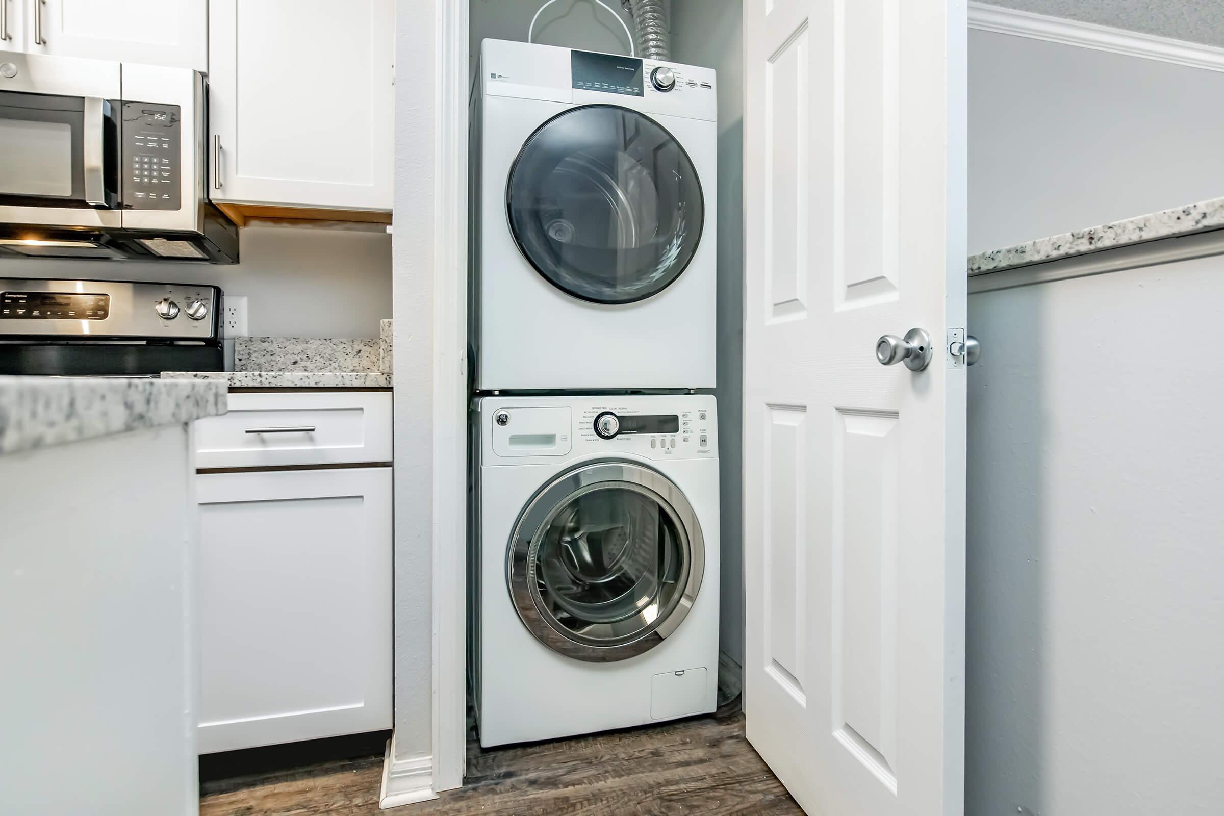 a stove top oven sitting next to a door