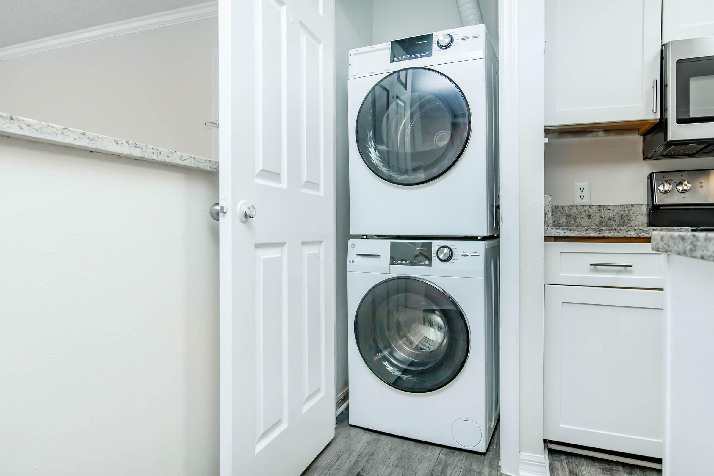 a stove top oven sitting inside of a refrigerator