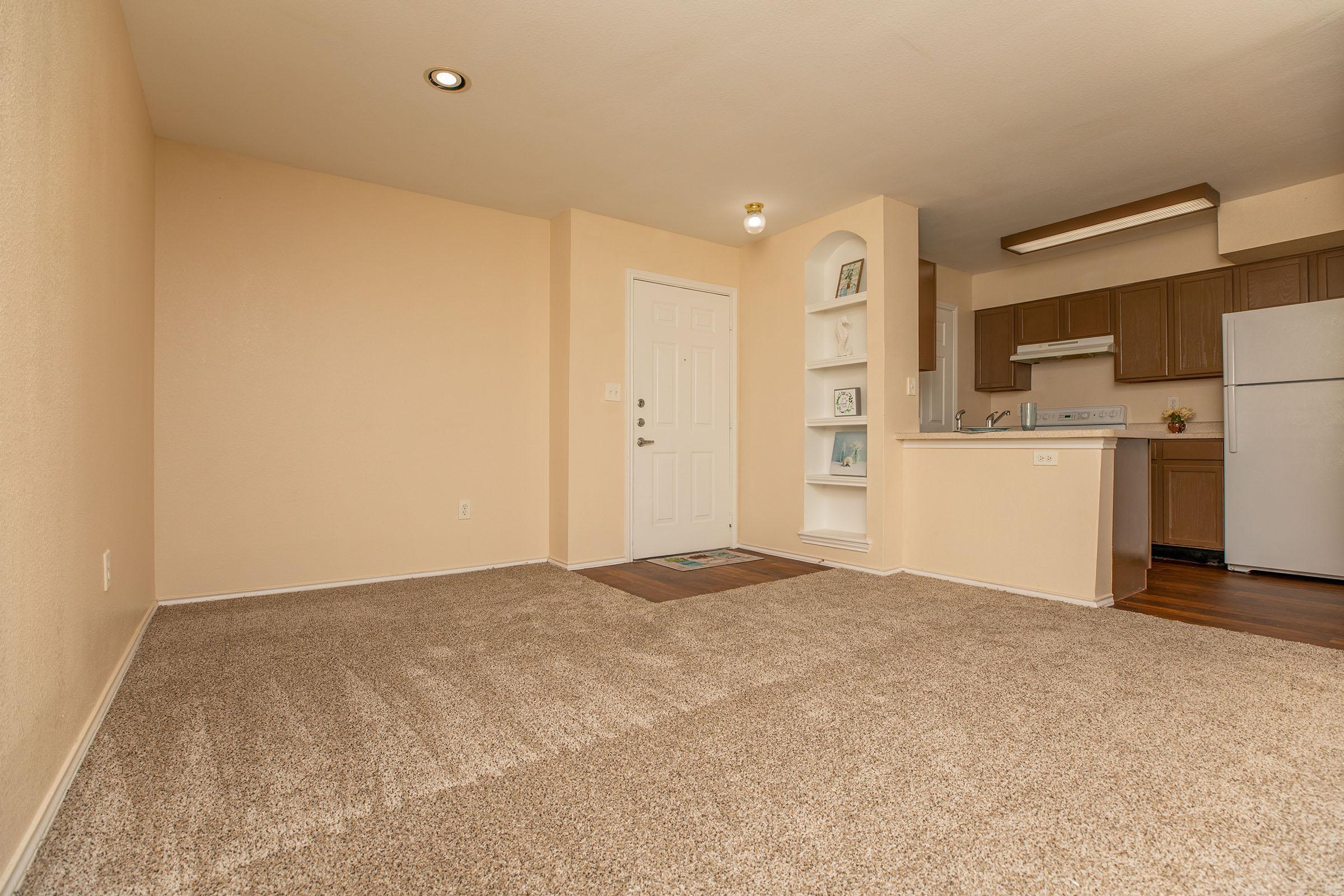 a bedroom with a bed in a room