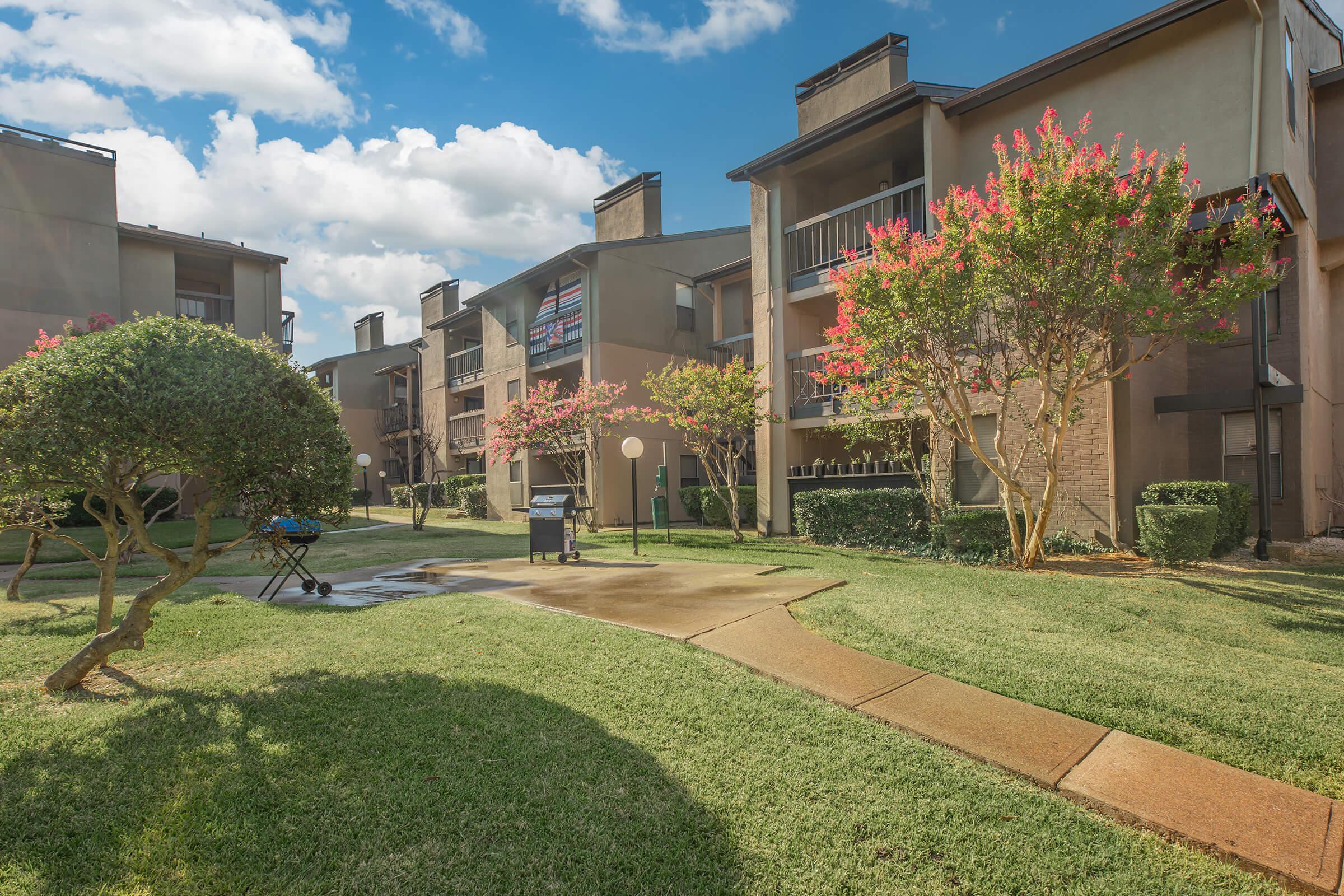 a large lawn in front of a building