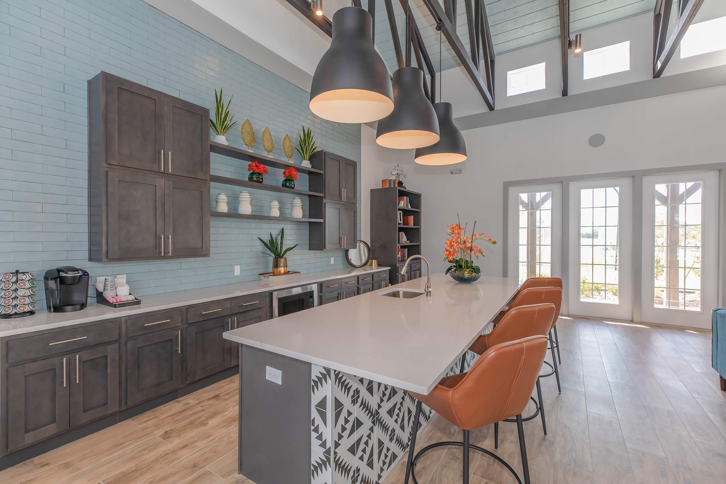 a kitchen with a table in a room