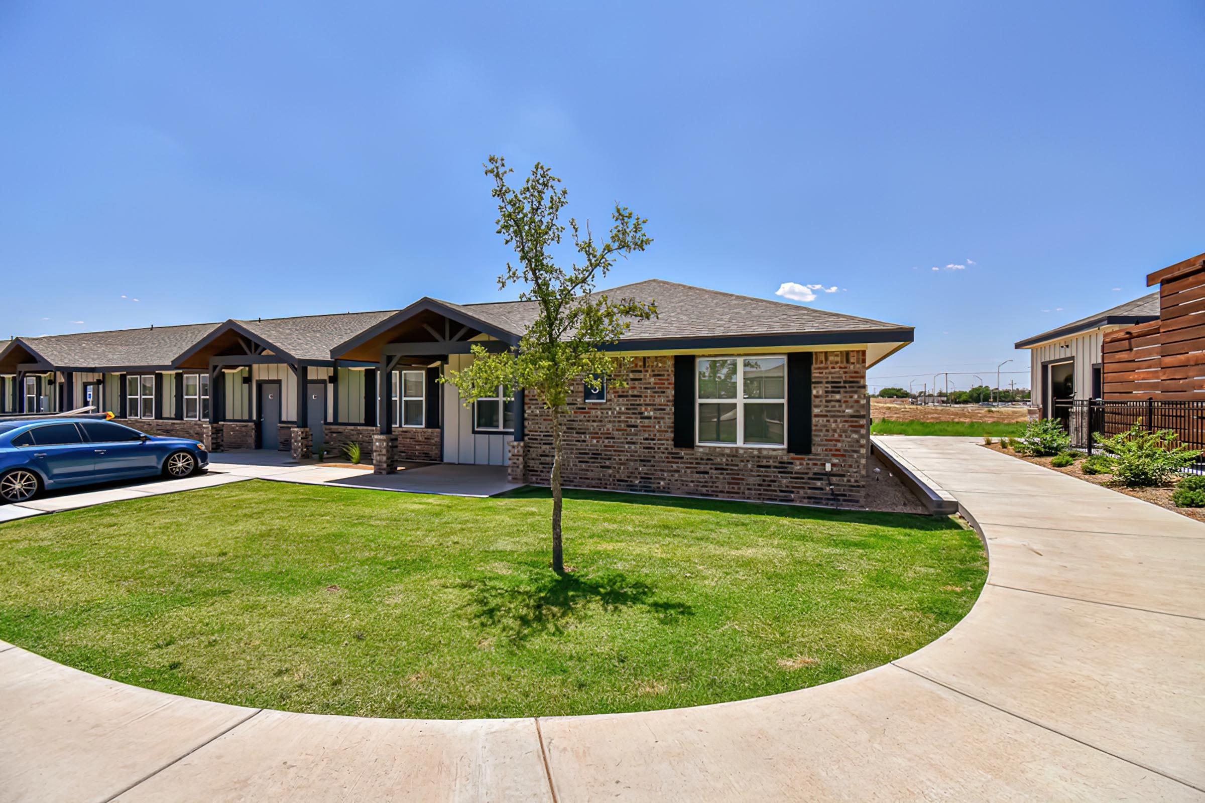 a large lawn in front of a house