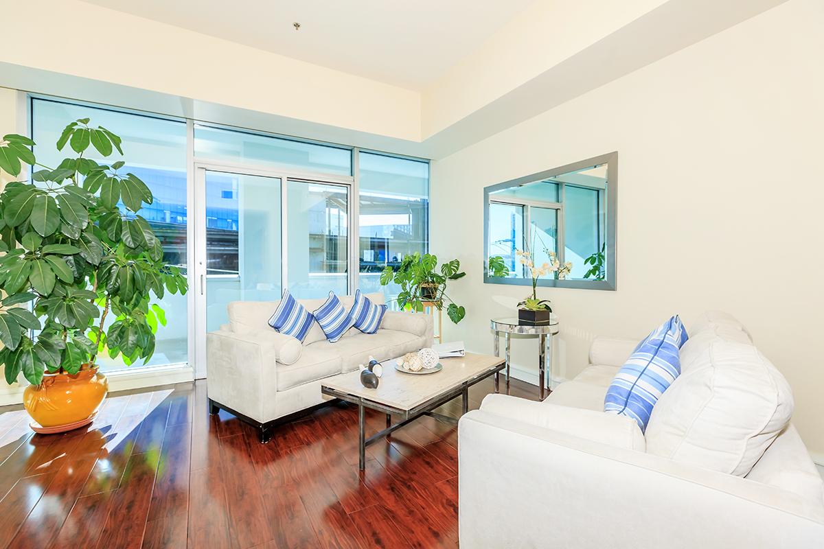 a room filled with furniture and a large window