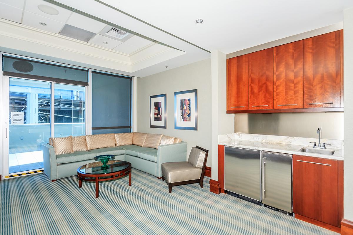 a bedroom with a bed in a room
