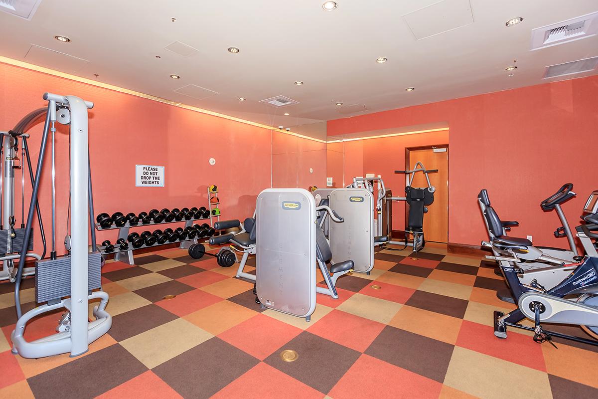 a red and white tile floor in a room
