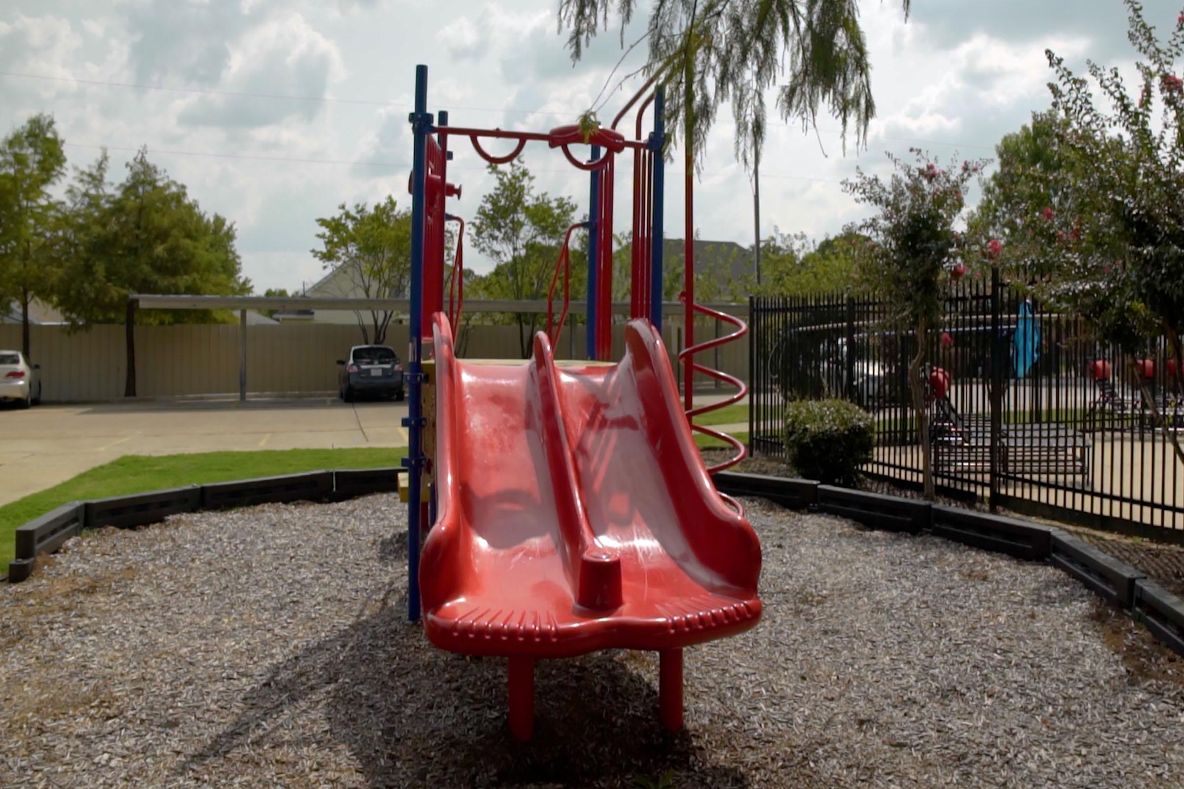 a close up of a slide in a park