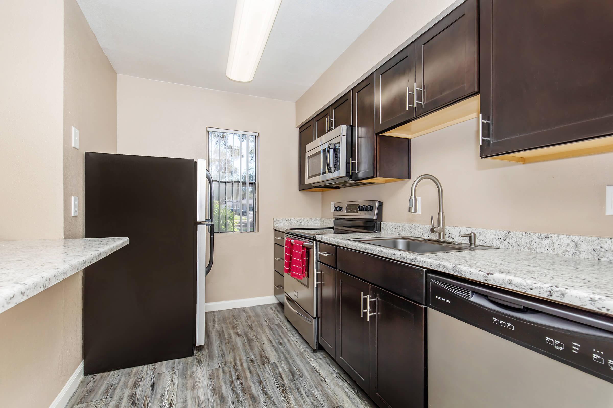 a modern kitchen with stainless steel appliances