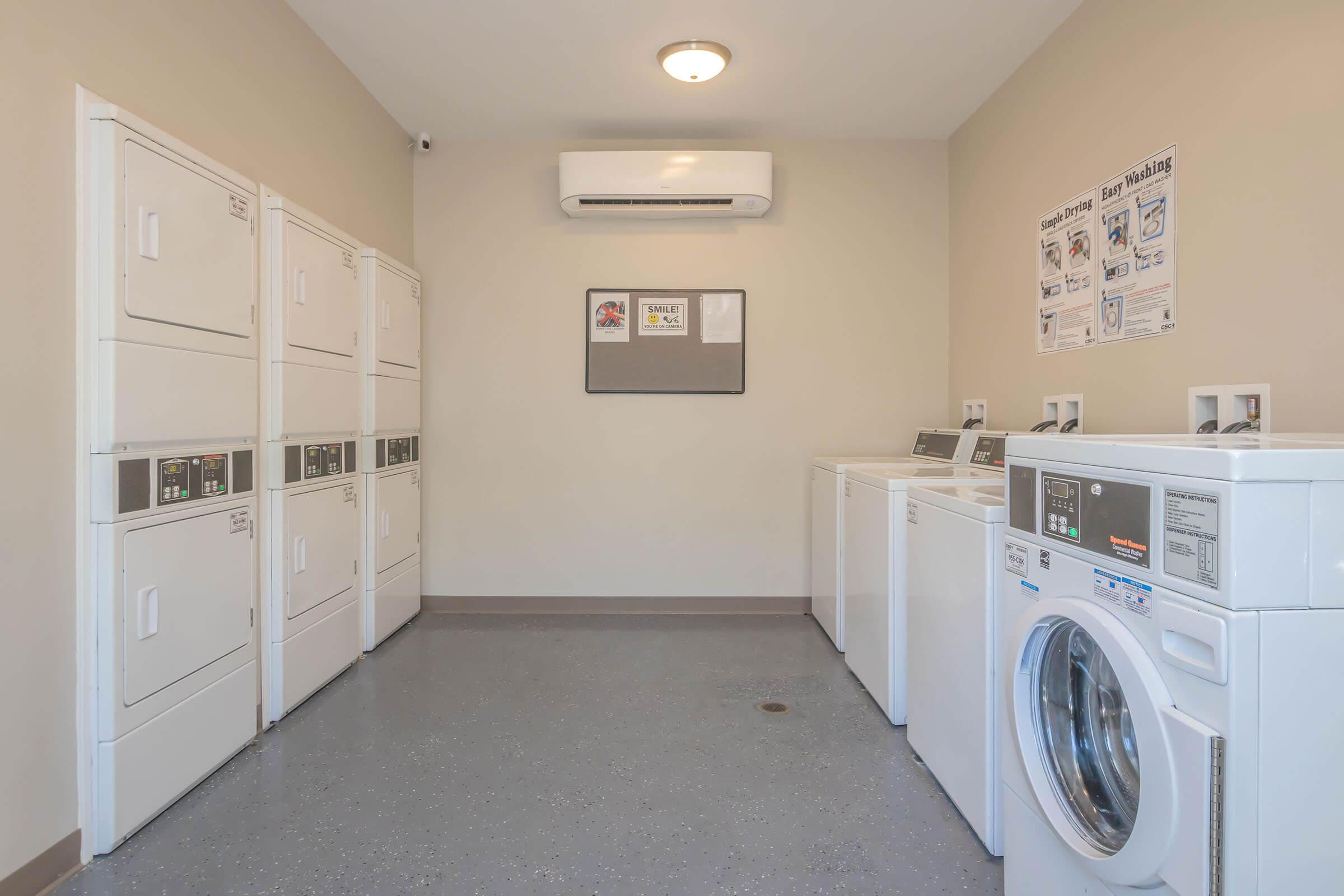 a kitchen with a sink and a refrigerator