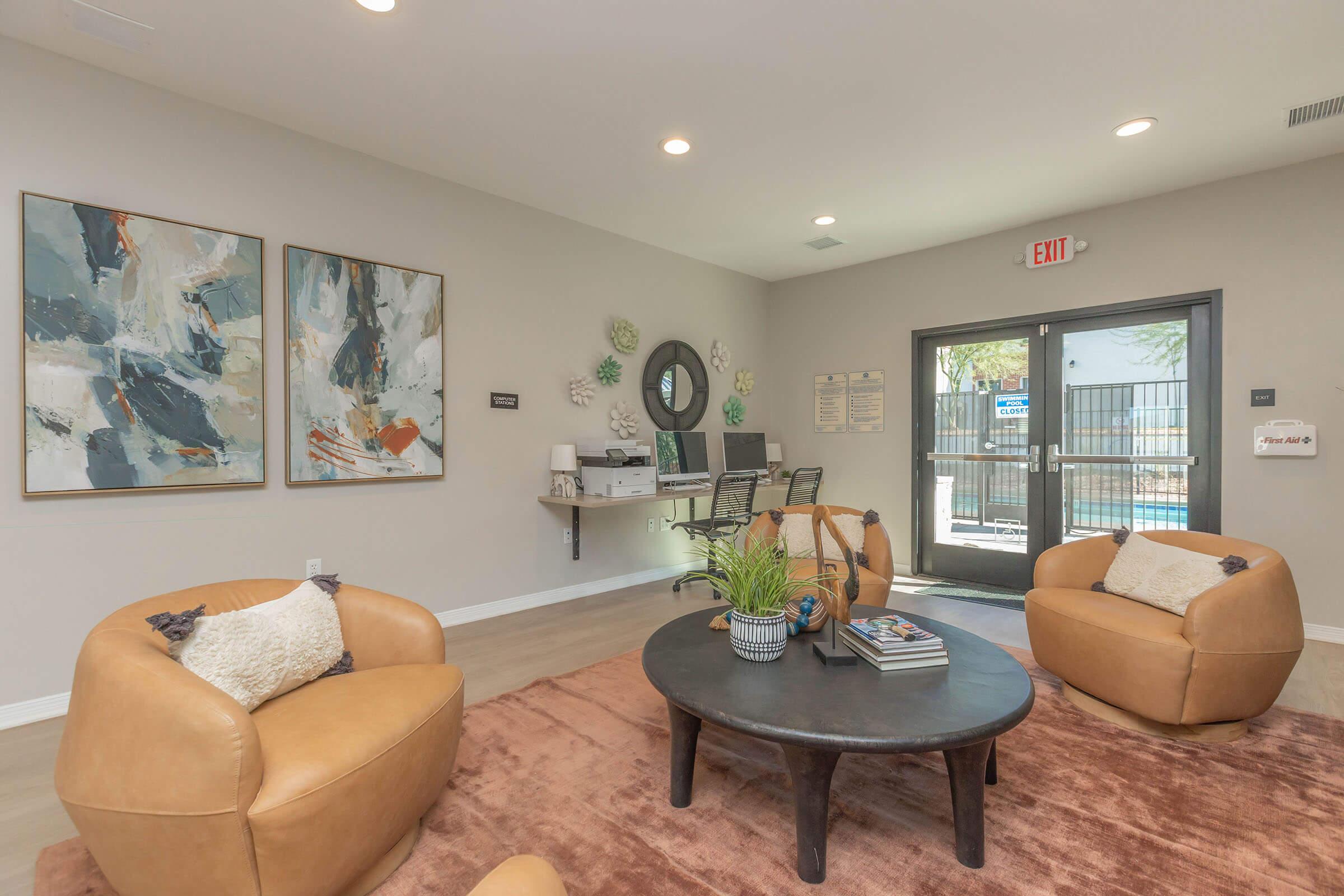 a living room filled with furniture and a fireplace