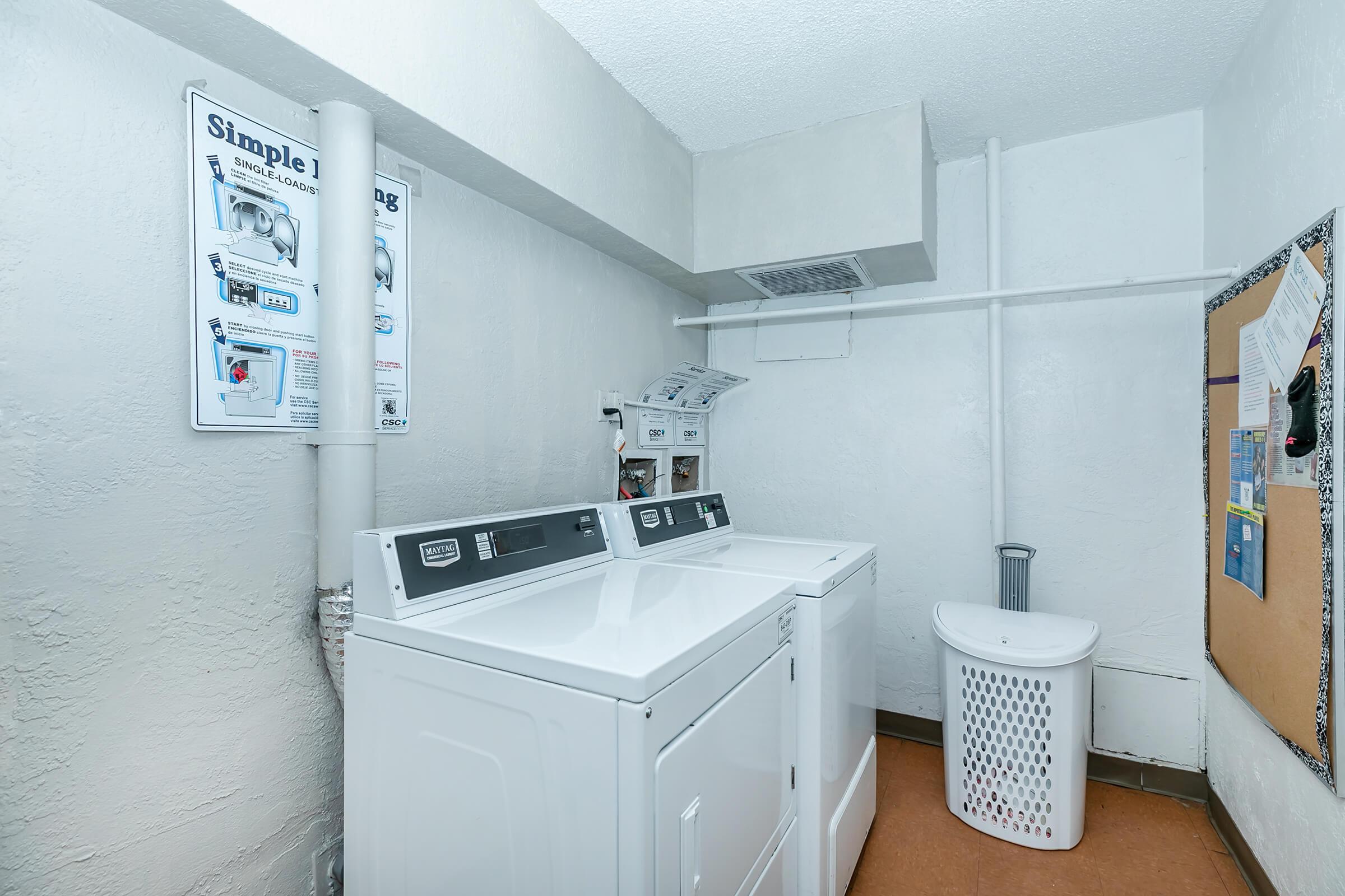 a kitchen with a sink and a refrigerator