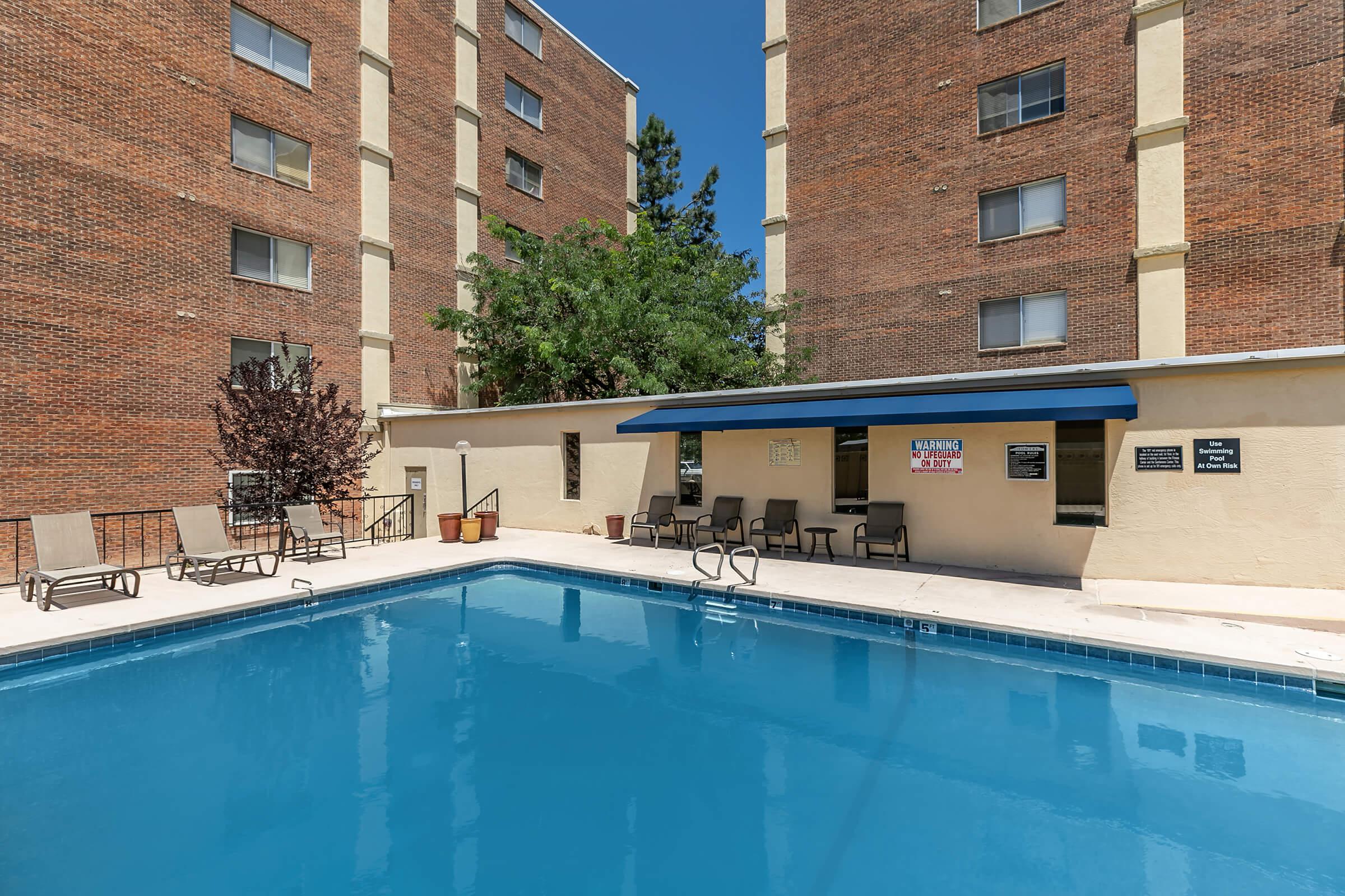 a pool next to a building