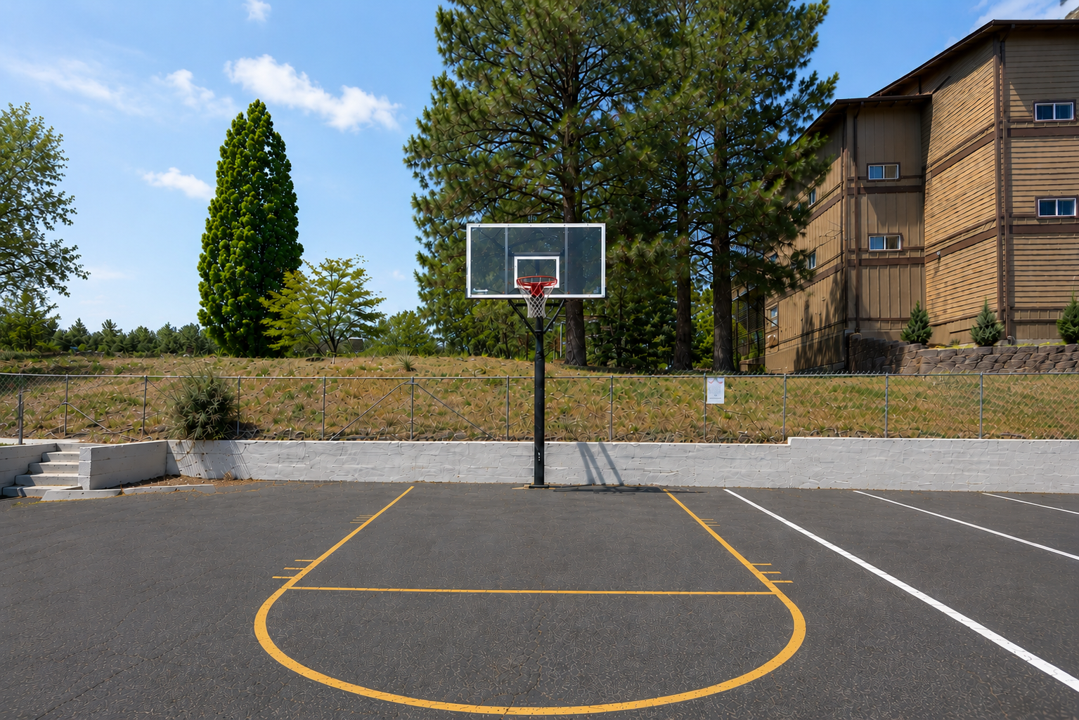 Elevate your game in our vibrant community, where residents enjoy a well-maintained basketball court surrounded by greenery and plenty of room to unwind.