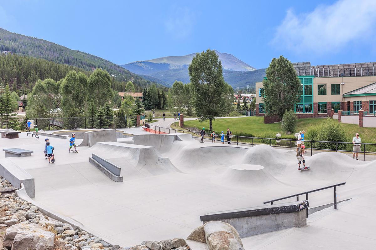 a man riding a skateboard up the side of a mountain