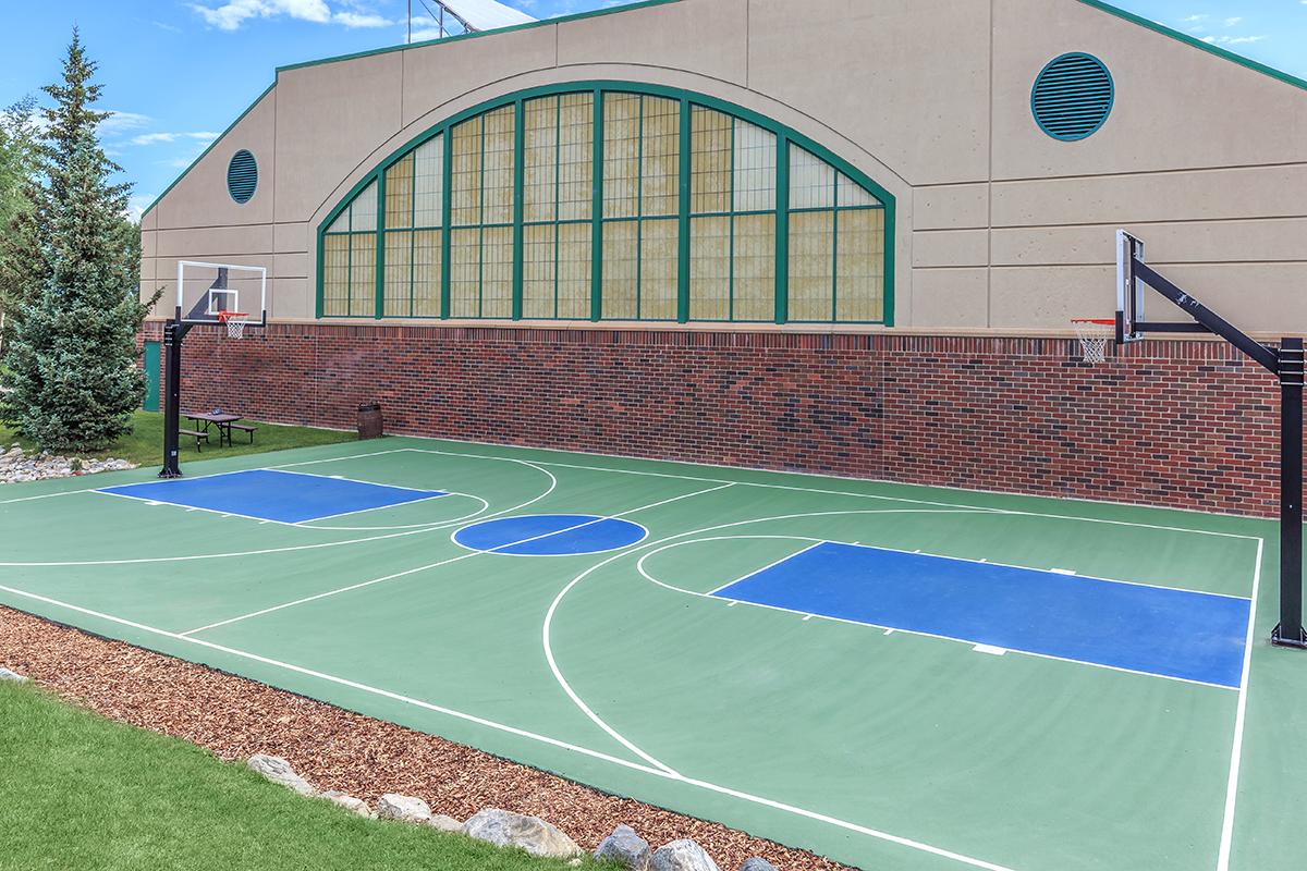 a green ball on a court