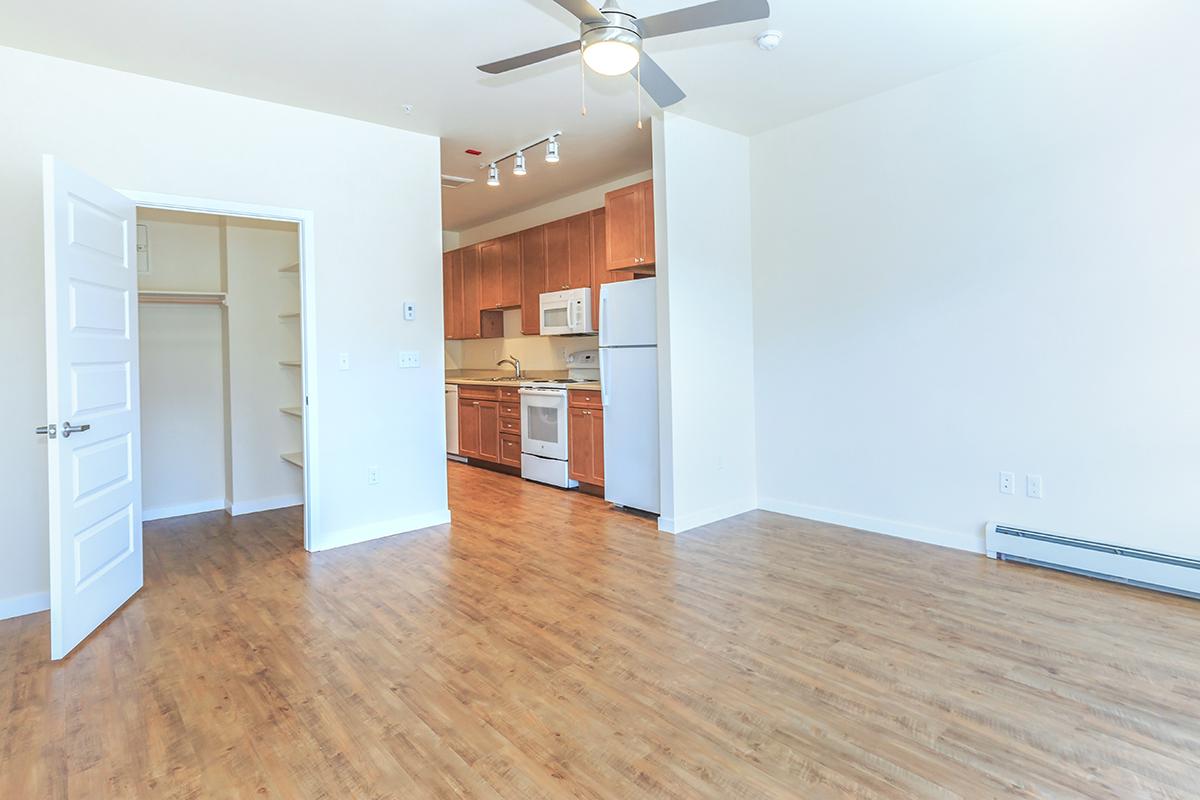 a kitchen with a wood floor