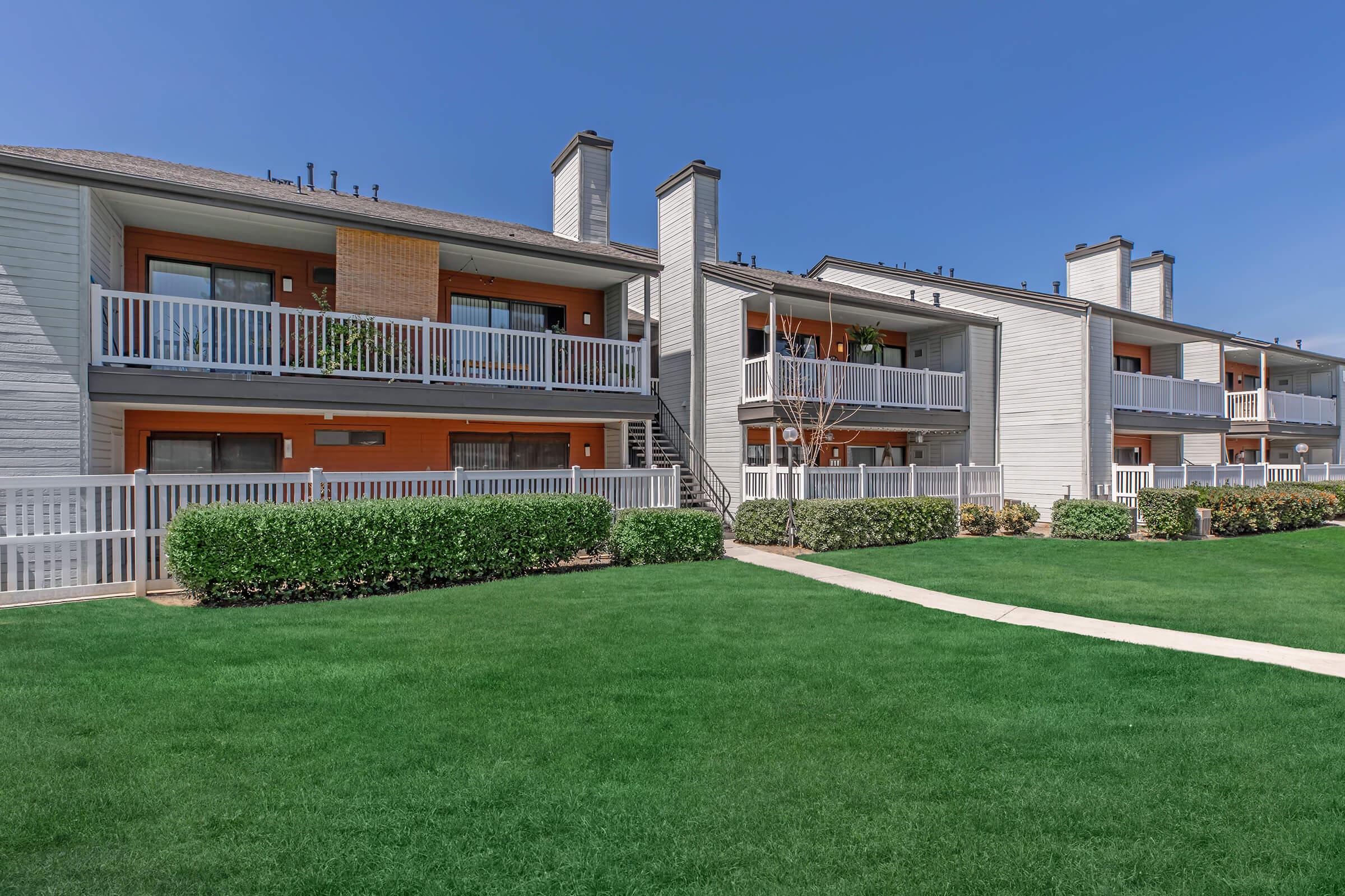 a large lawn in front of a house