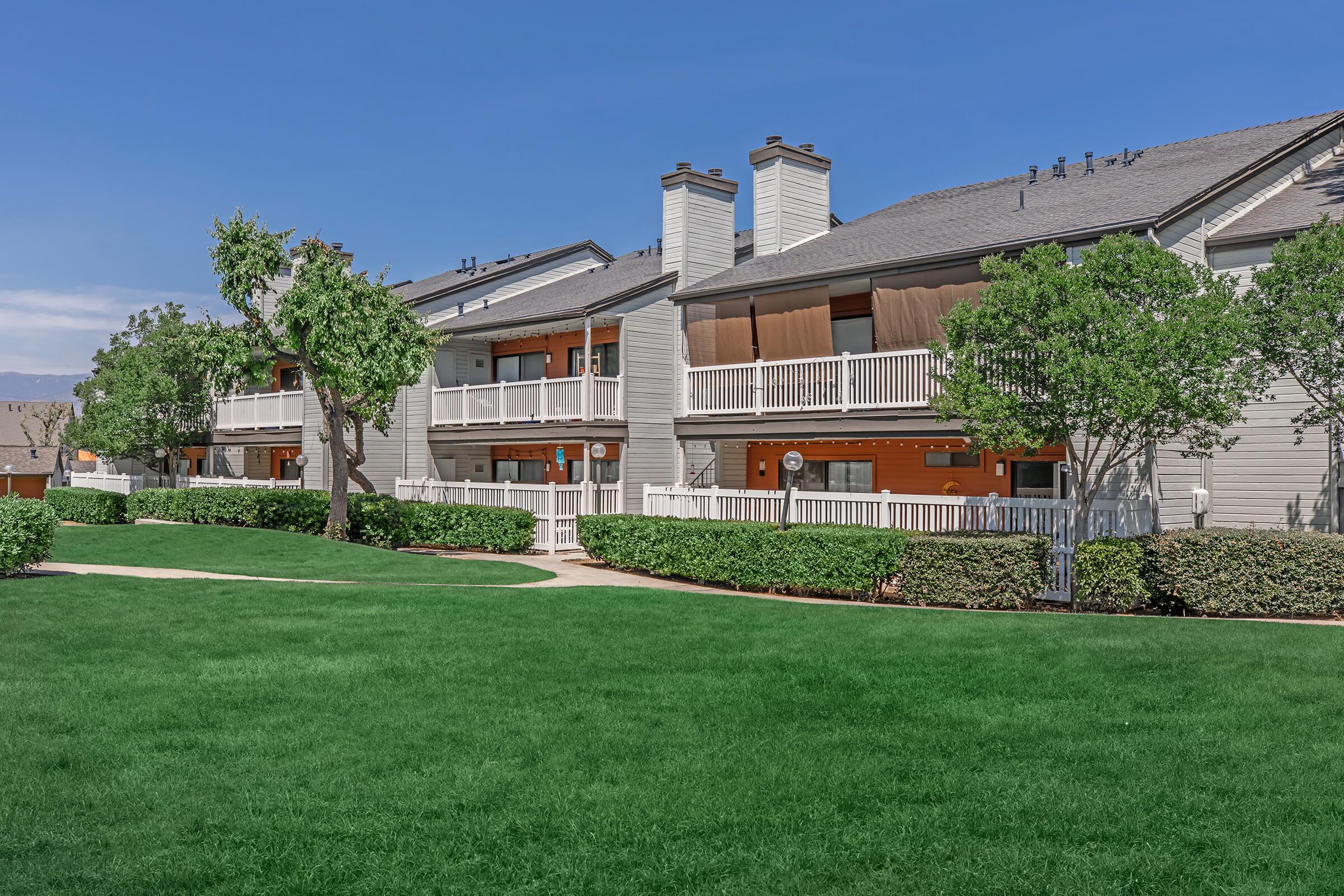 a large lawn in front of a house